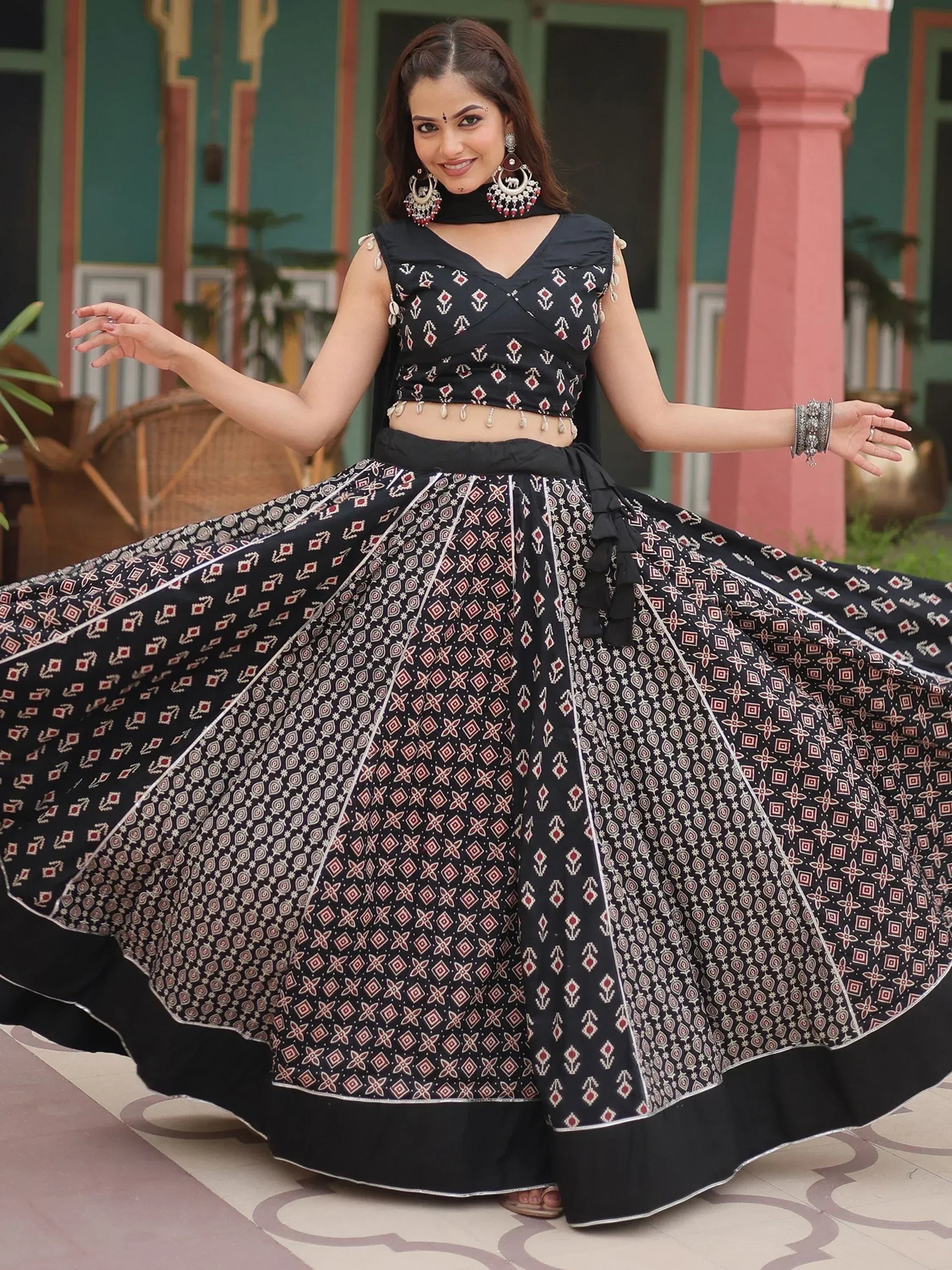 Black printed lehenga choli with geometric patterns, perfect for Indian ethnic wear and festive occasions.