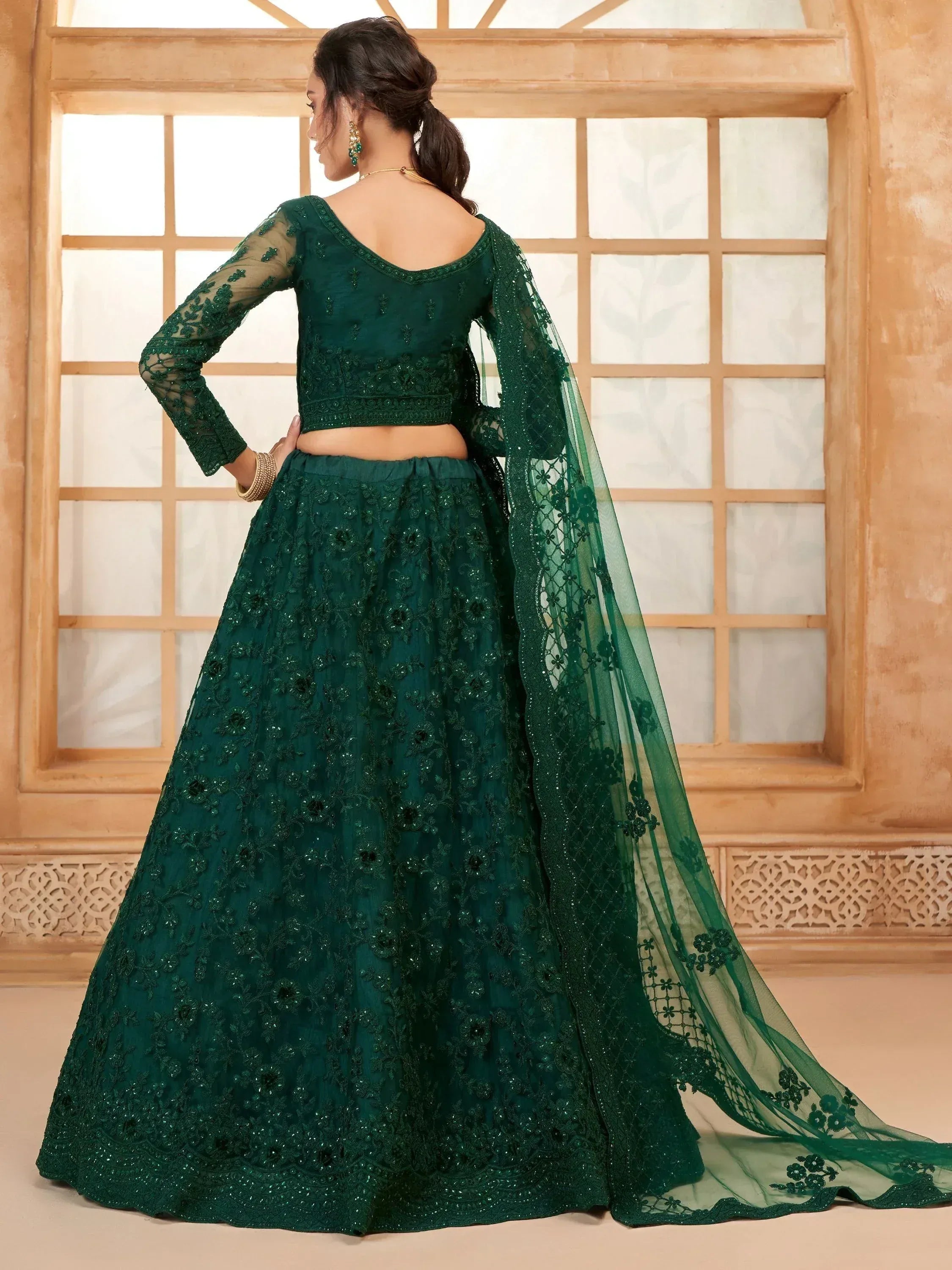 Emerald green embroidered lehenga choli with sheer dupatta, Indian ethnic wear for weddings and parties