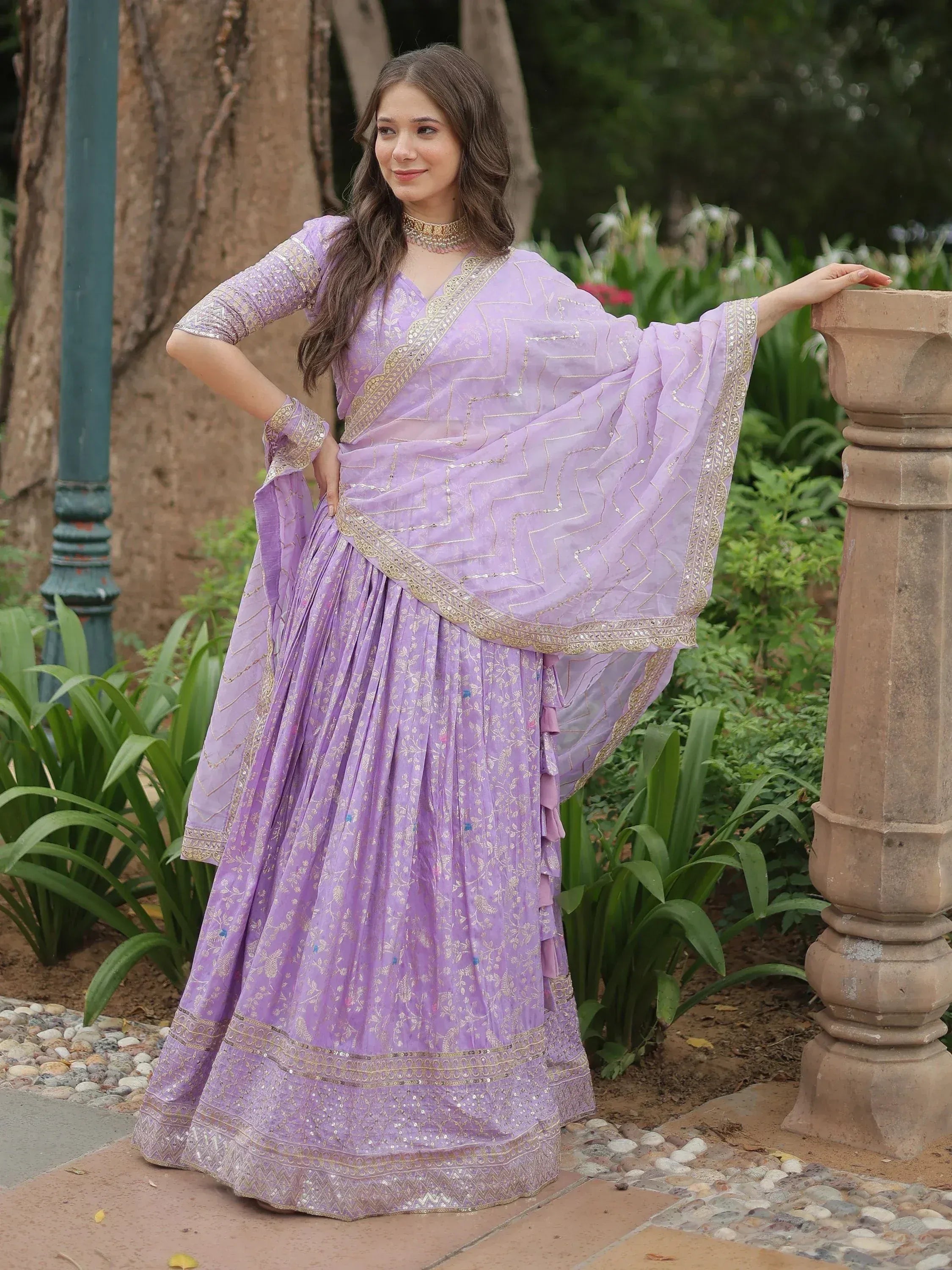 Lavender designer lehenga choli with gold embroidery, perfect for Indian ethnic wear events