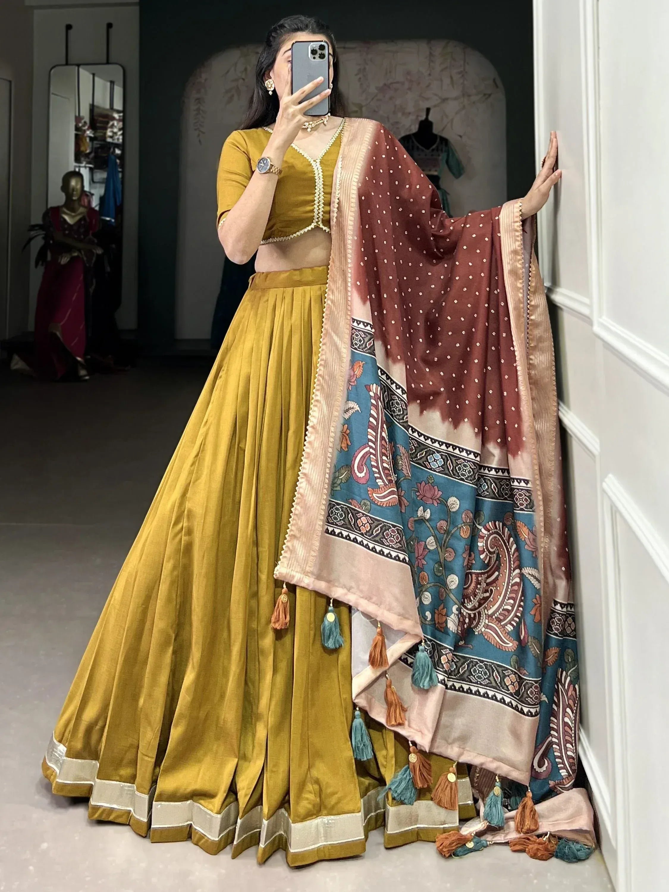 Mustard yellow lehenga choli with printed dupatta, ethnic Indian wear for women