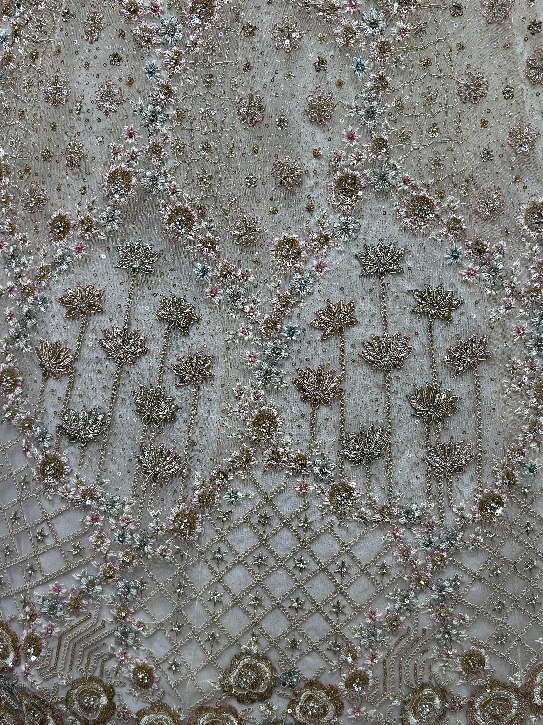 Intricate floral embroidery with sequins on sheer fabric, perfect for designer lehenga or ethnic gown.