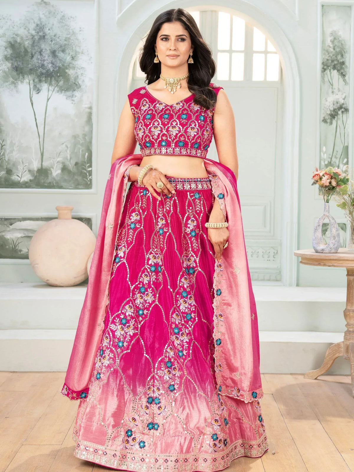 Pink embroidered lehenga choli with floral motifs and matching dupatta, Indian ethnic wear