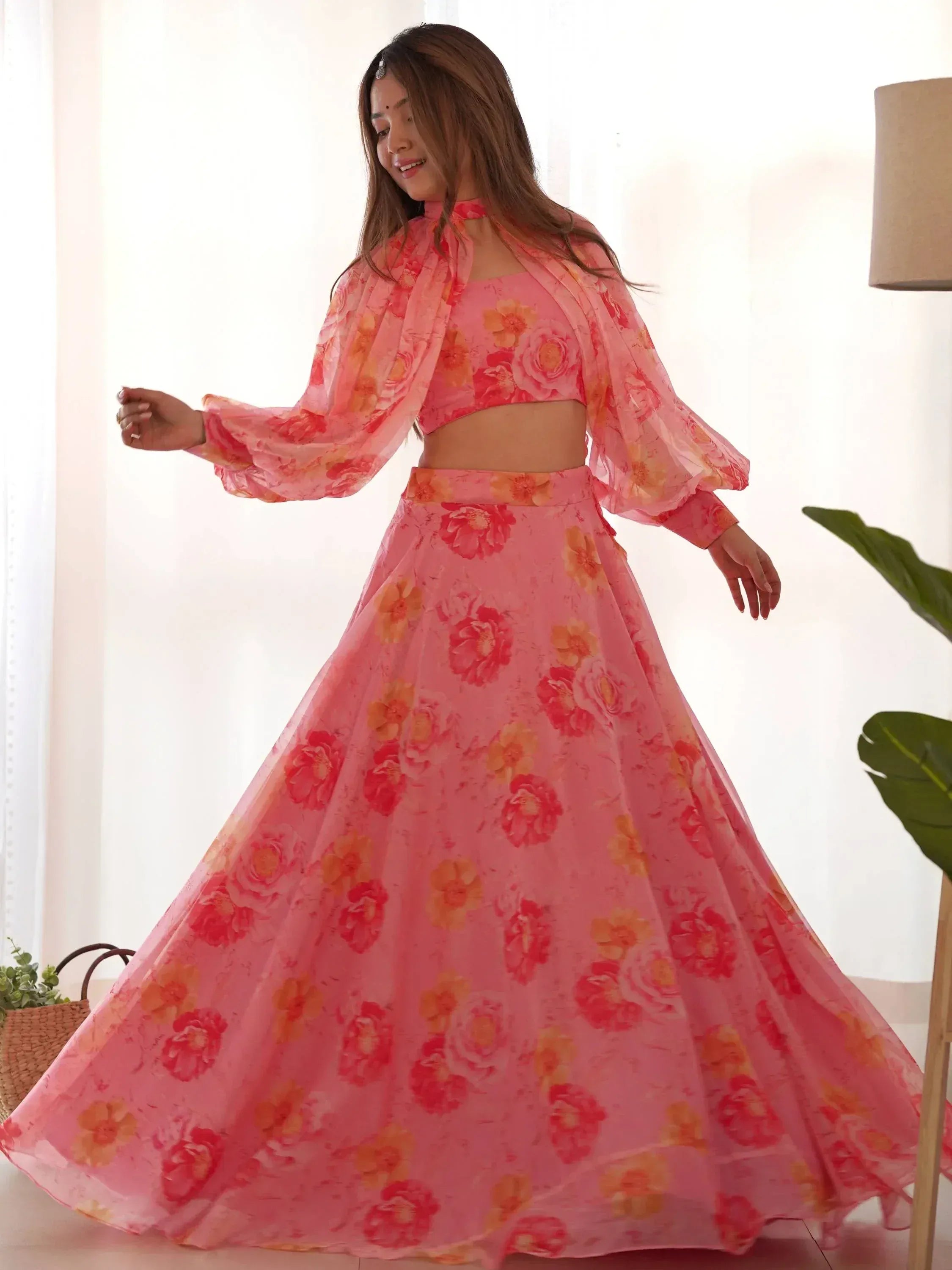 Pink floral lehenga choli with sheer cape, perfect for Indian ethnic wear and festive occasions