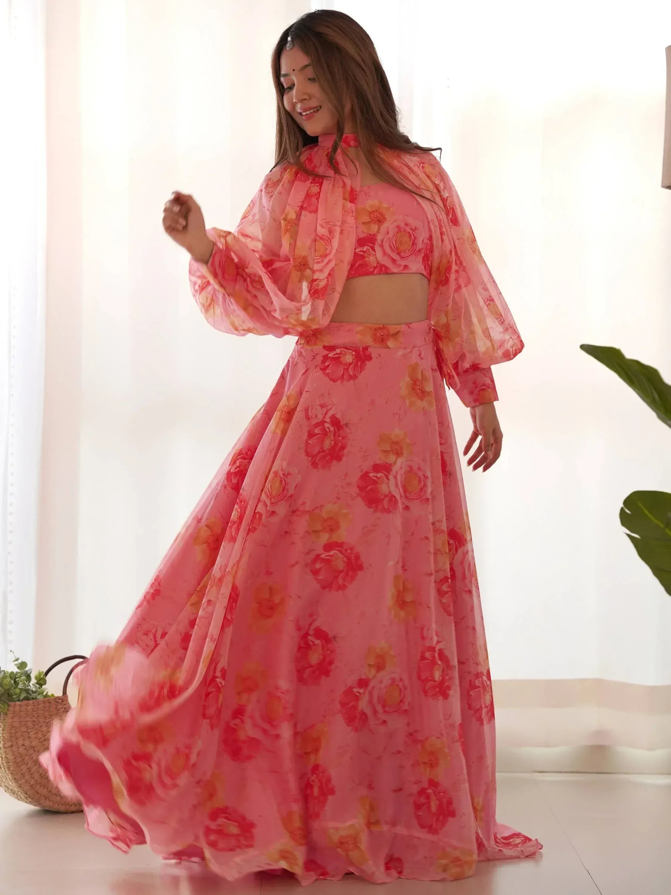 Pink floral lehenga choli with sheer cape, perfect for Indian ethnic wear occasions