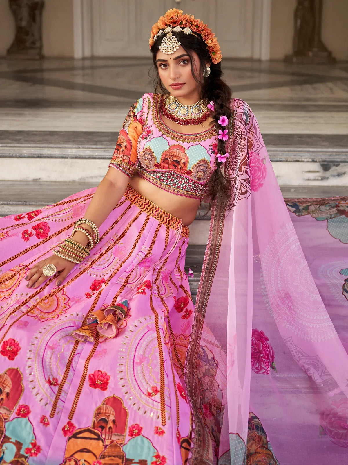 Pink floral print lehenga choli with temple motifs, perfect for Indian ethnic wear occasions