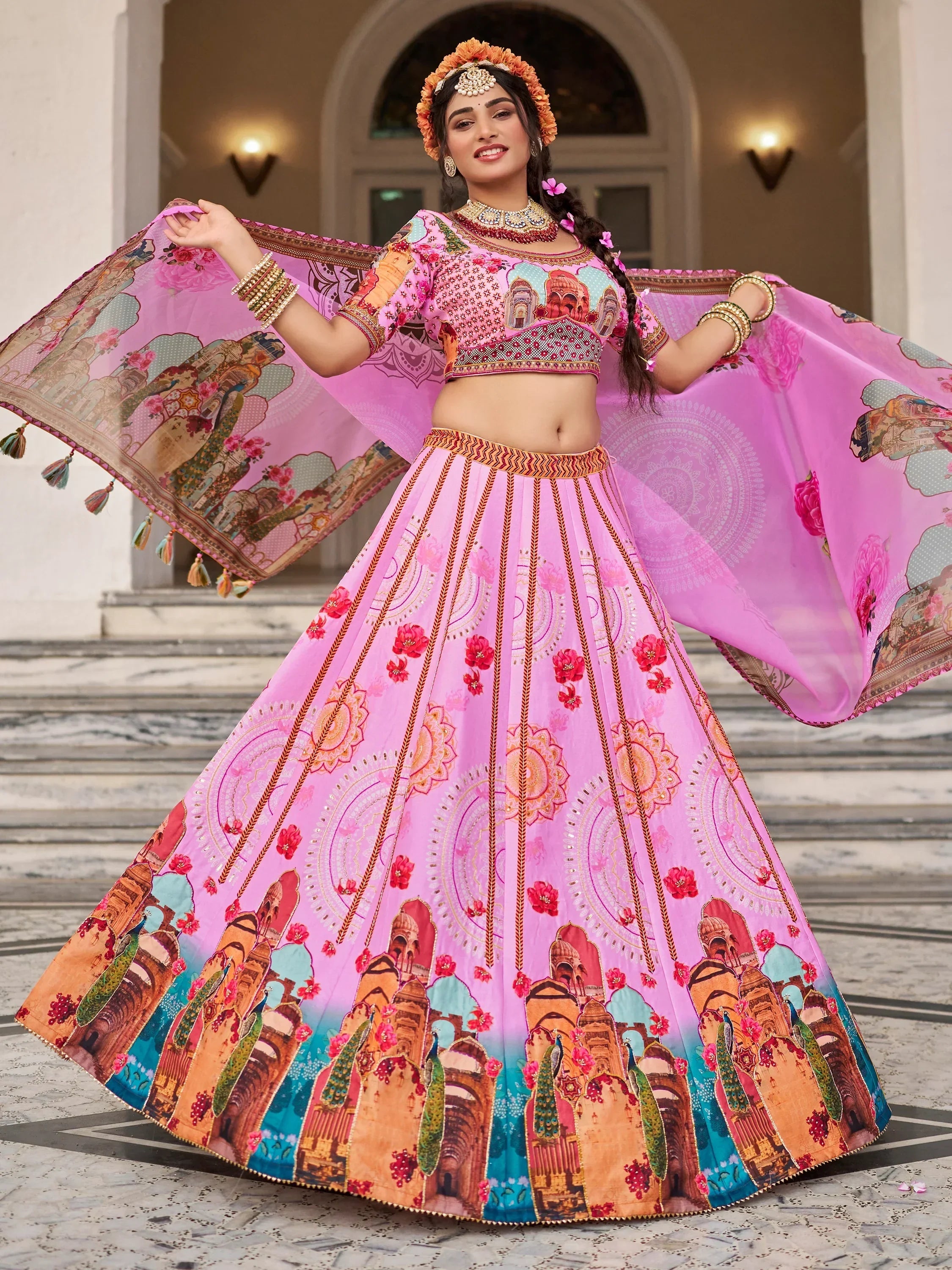 Pink printed lehenga choli with temple and peacock motifs, perfect for Indian ethnic wear events