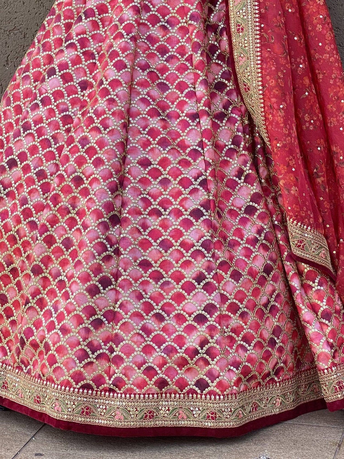 Red designer lehenga with scalloped pearl embroidery and gold border, ethnic Indian wear