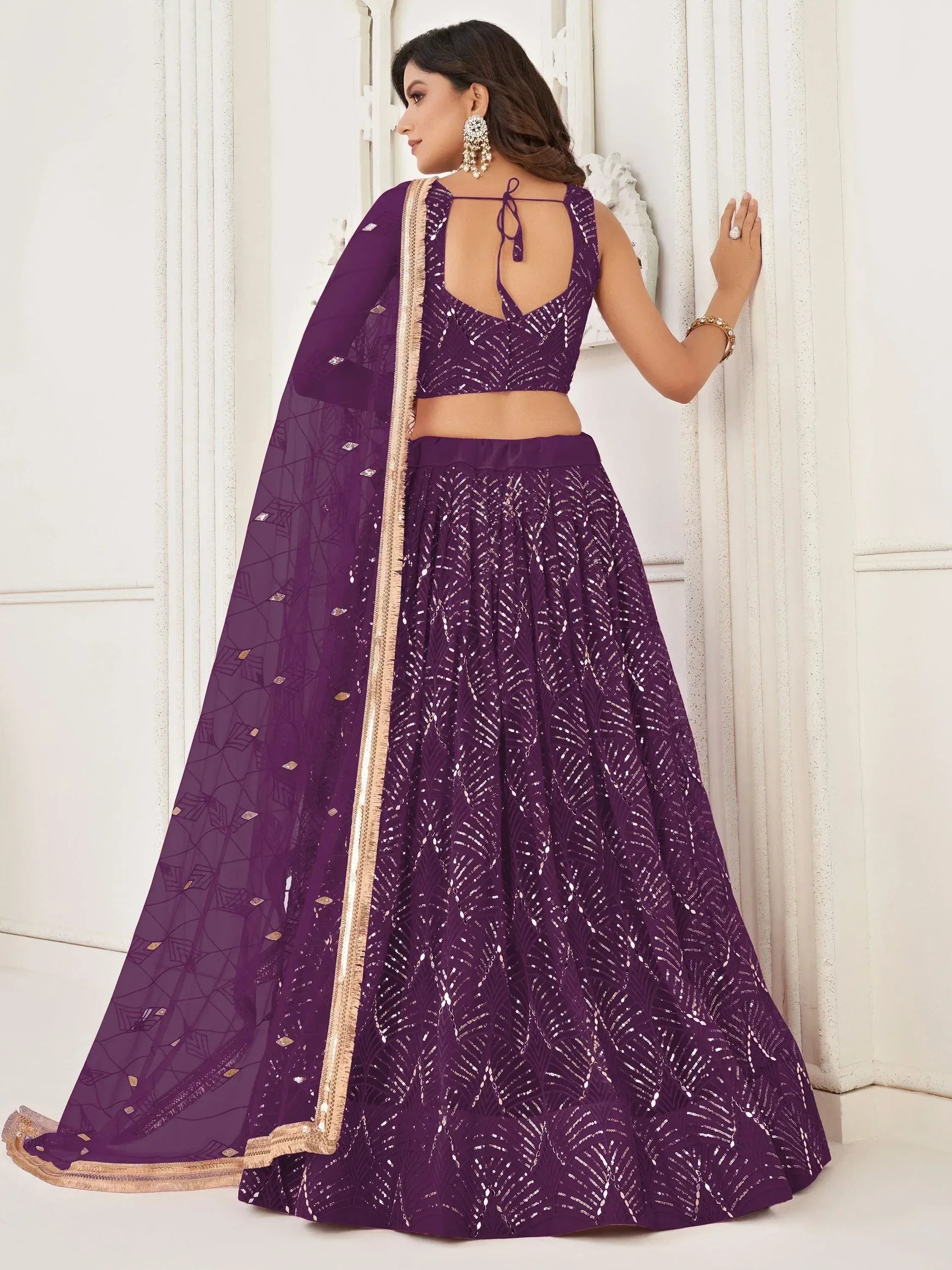 Purple sequin lehenga choli with gold trim, back view, Indian ethnic wear