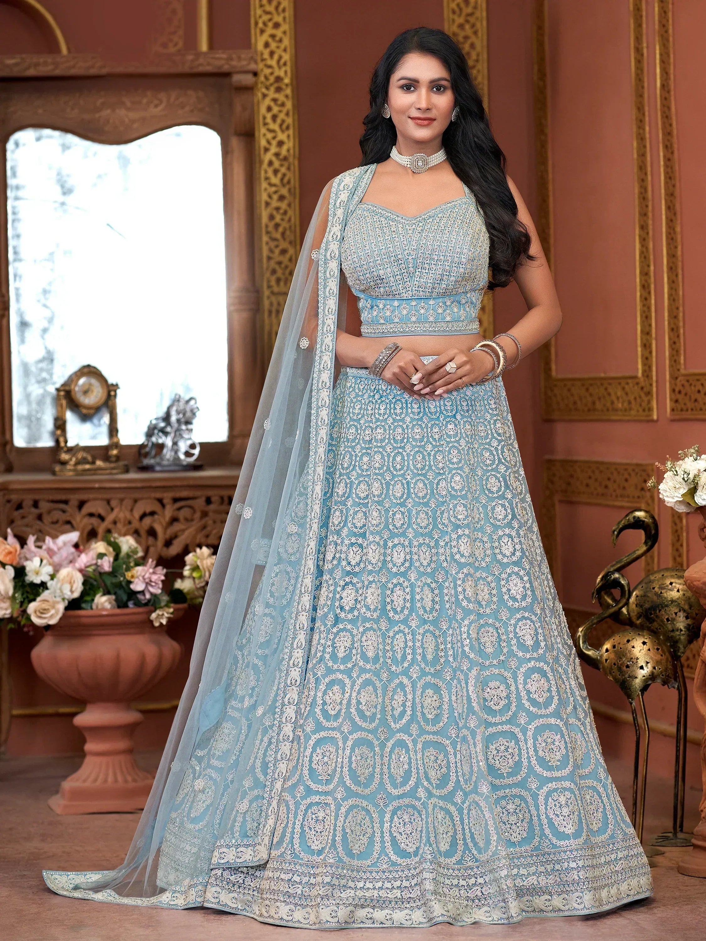 Light blue embroidered lehenga choli with dupatta, perfect for Indian weddings and festive occasions