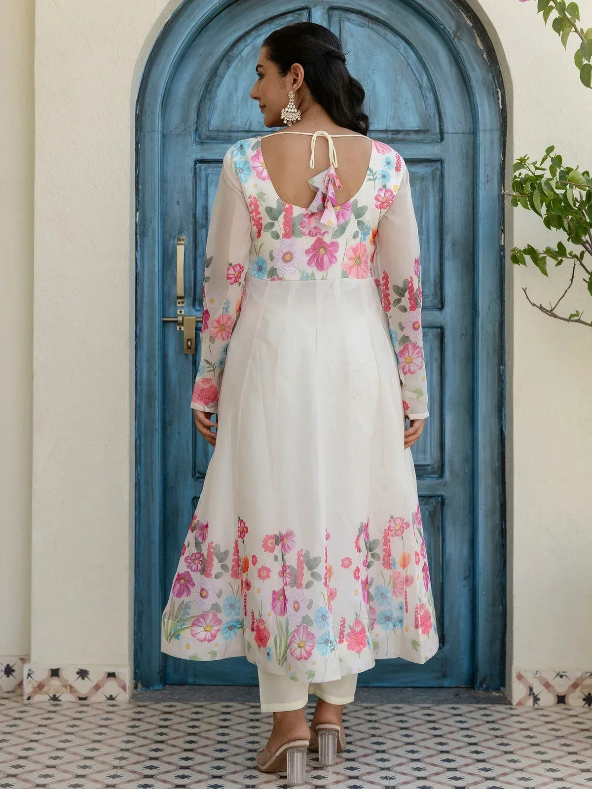 Floral print ethnic gown with back tie detail, paired with palazzo pants, perfect for Indian occasions.