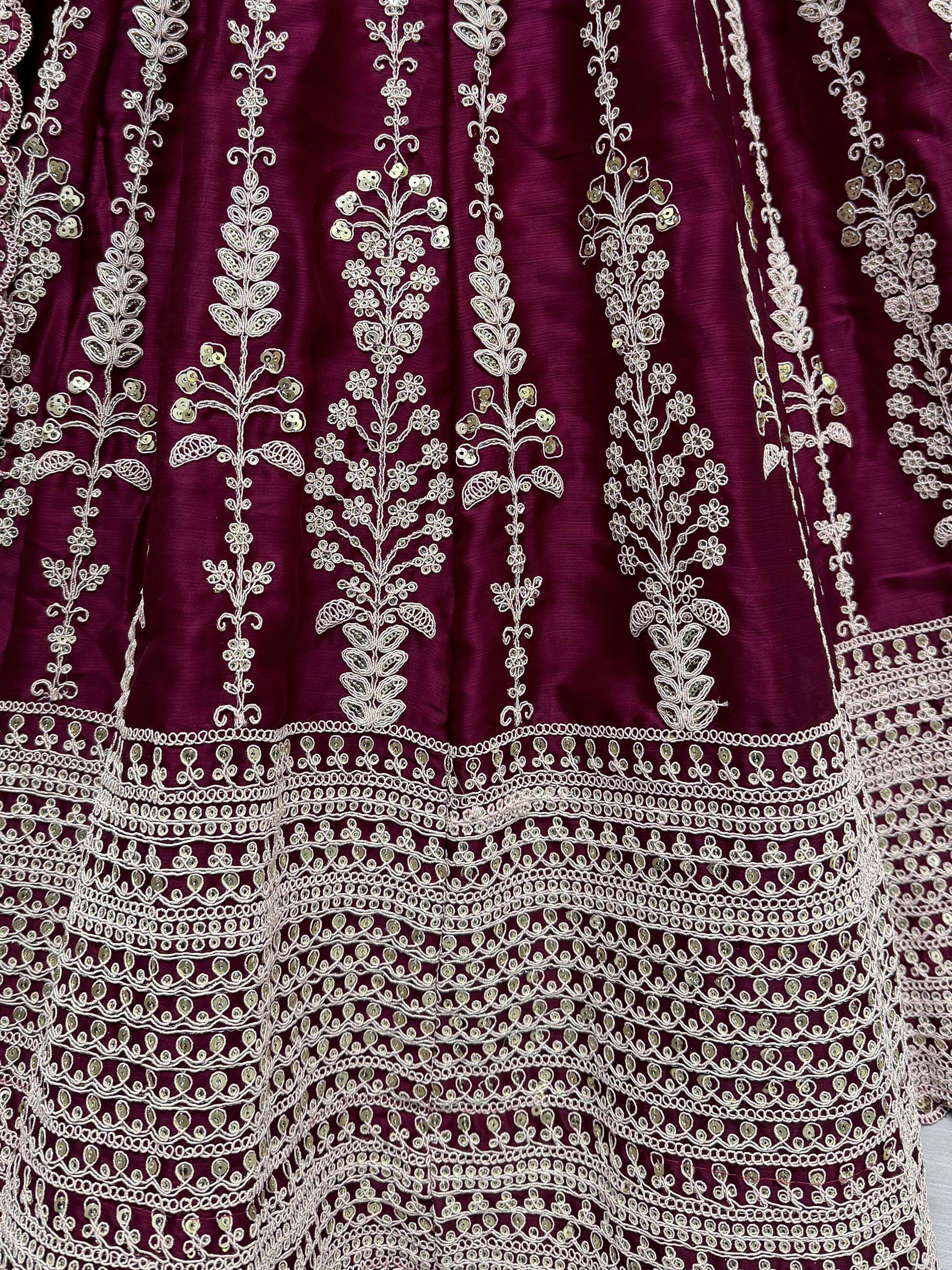 Purple ethnic gown with silver floral embroidery and sequin detailing for festive occasions