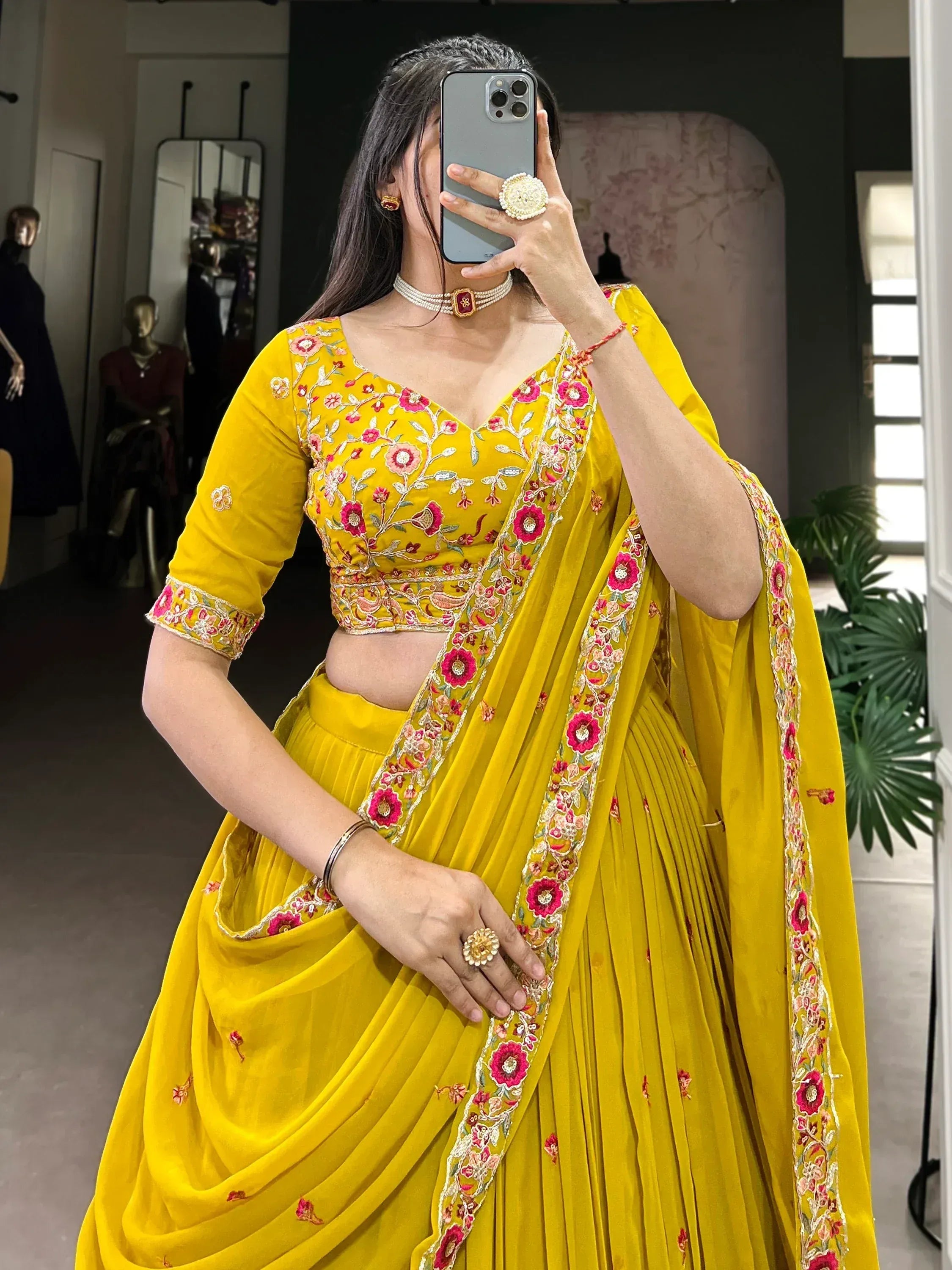 Yellow floral embroidered lehenga choli with pleated skirt and matching dupatta, Indian ethnic wear