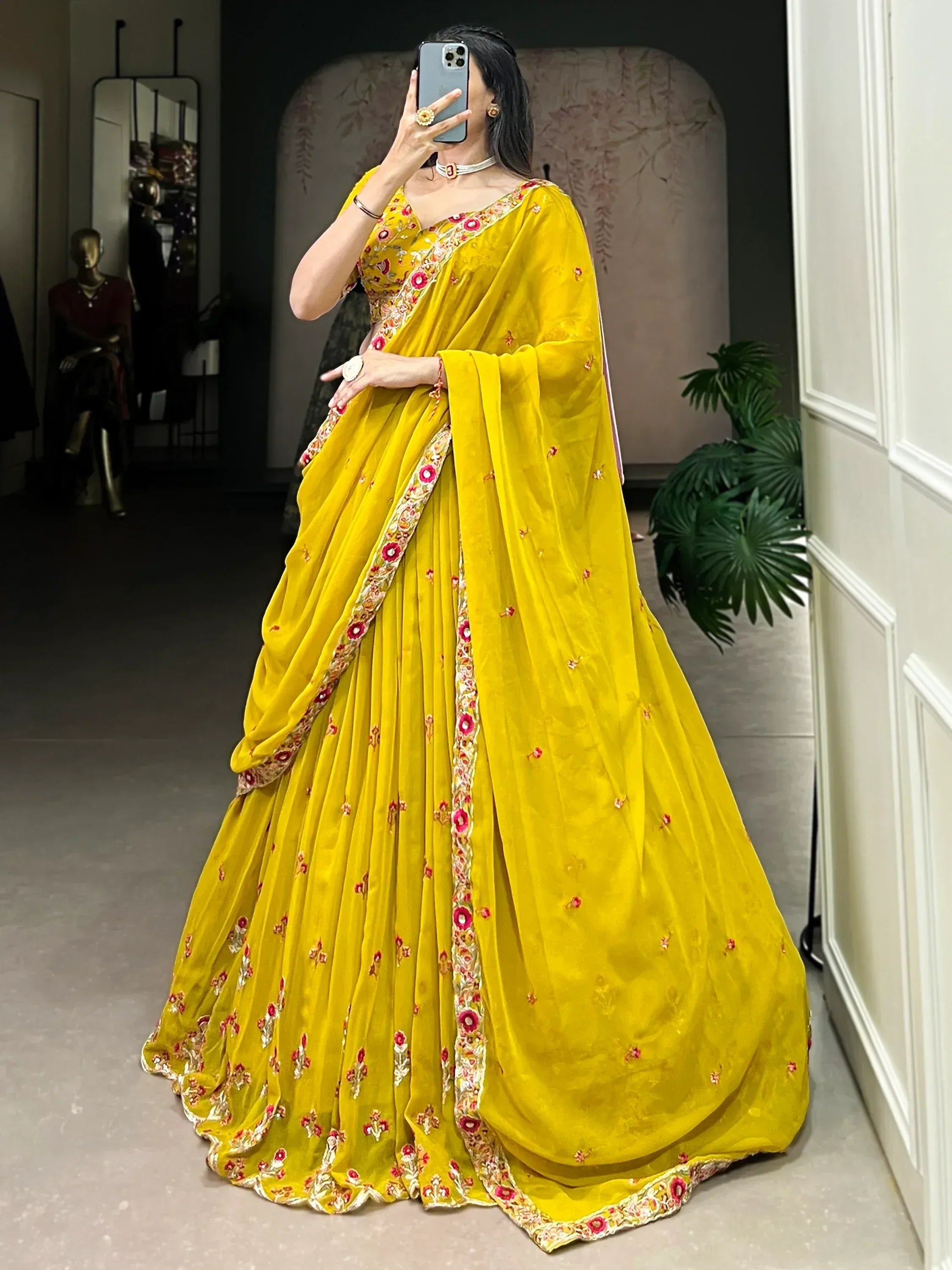 Yellow embroidered lehenga choli with floral detailing, perfect for Indian ethnic wear occasions