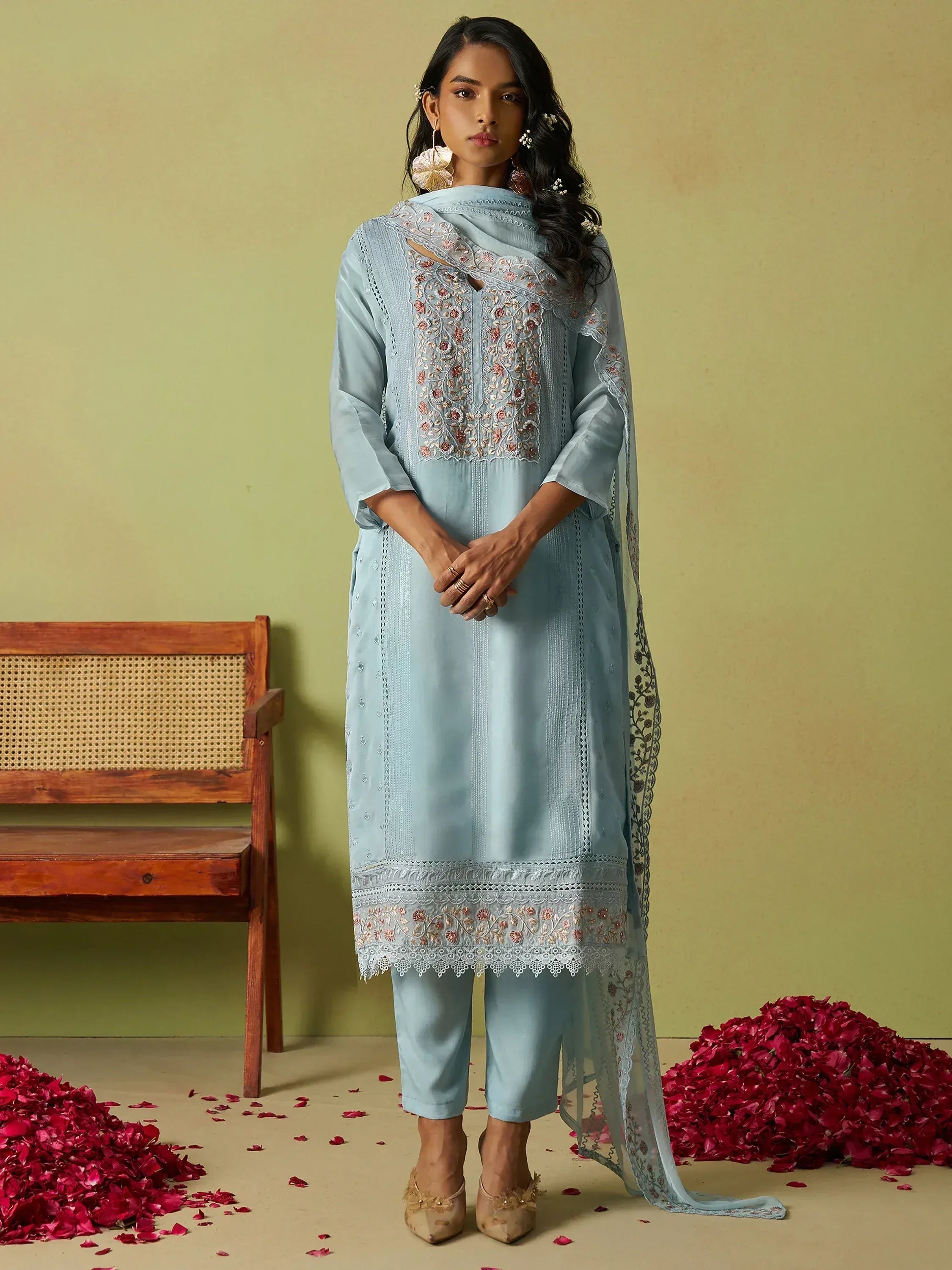 Light blue embroidered salwar kameez with floral detailing, perfect for ethnic occasions