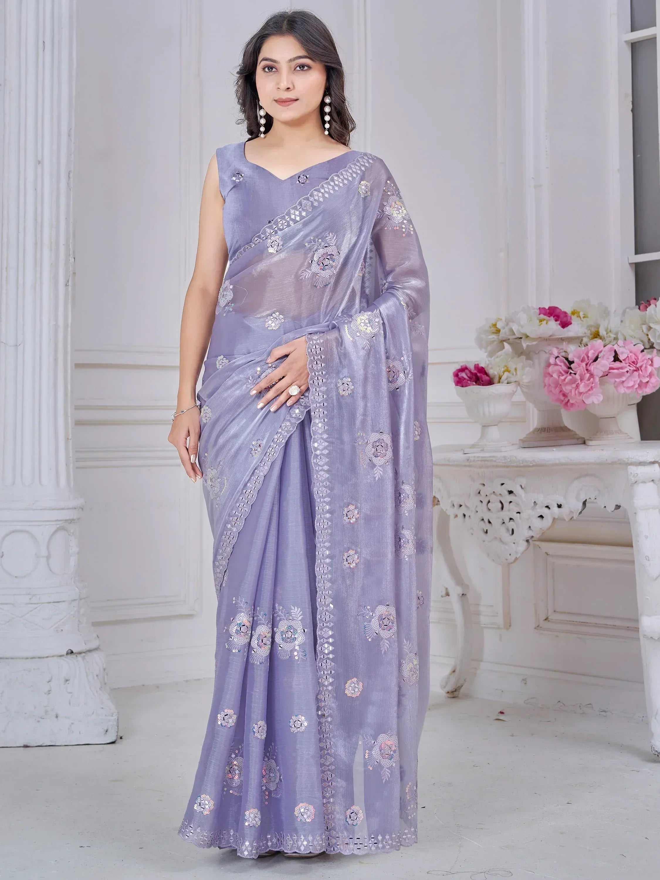 Lavender designer saree with floral sequin embroidery, perfect for Indian ethnic occasions.