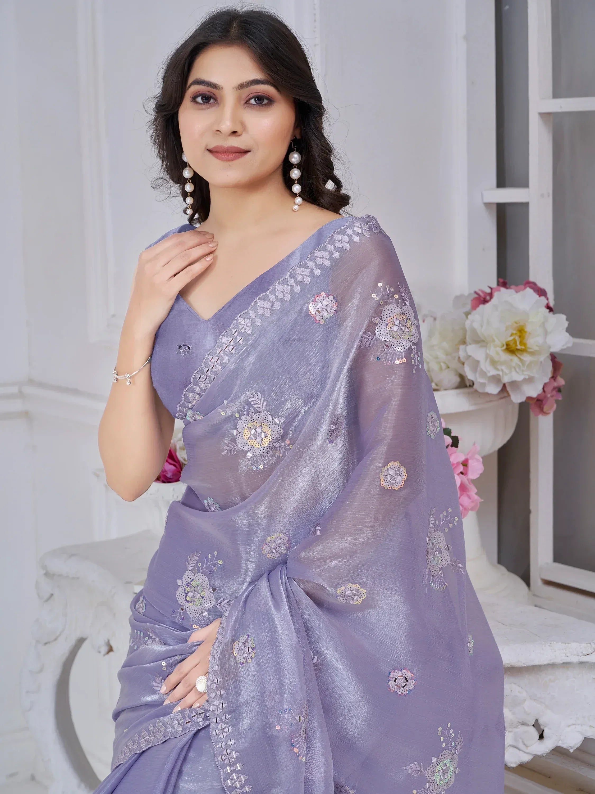 Lavender saree with floral sequin embroidery, perfect for Indian ethnic wear occasions