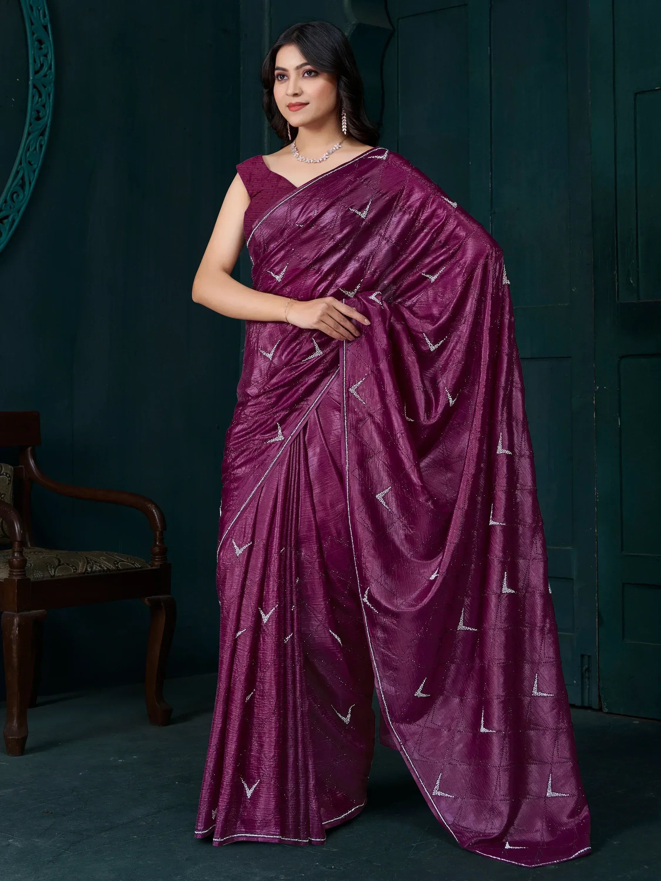 Elegant purple saree with silver geometric embroidery, perfect for Indian ethnic occasions