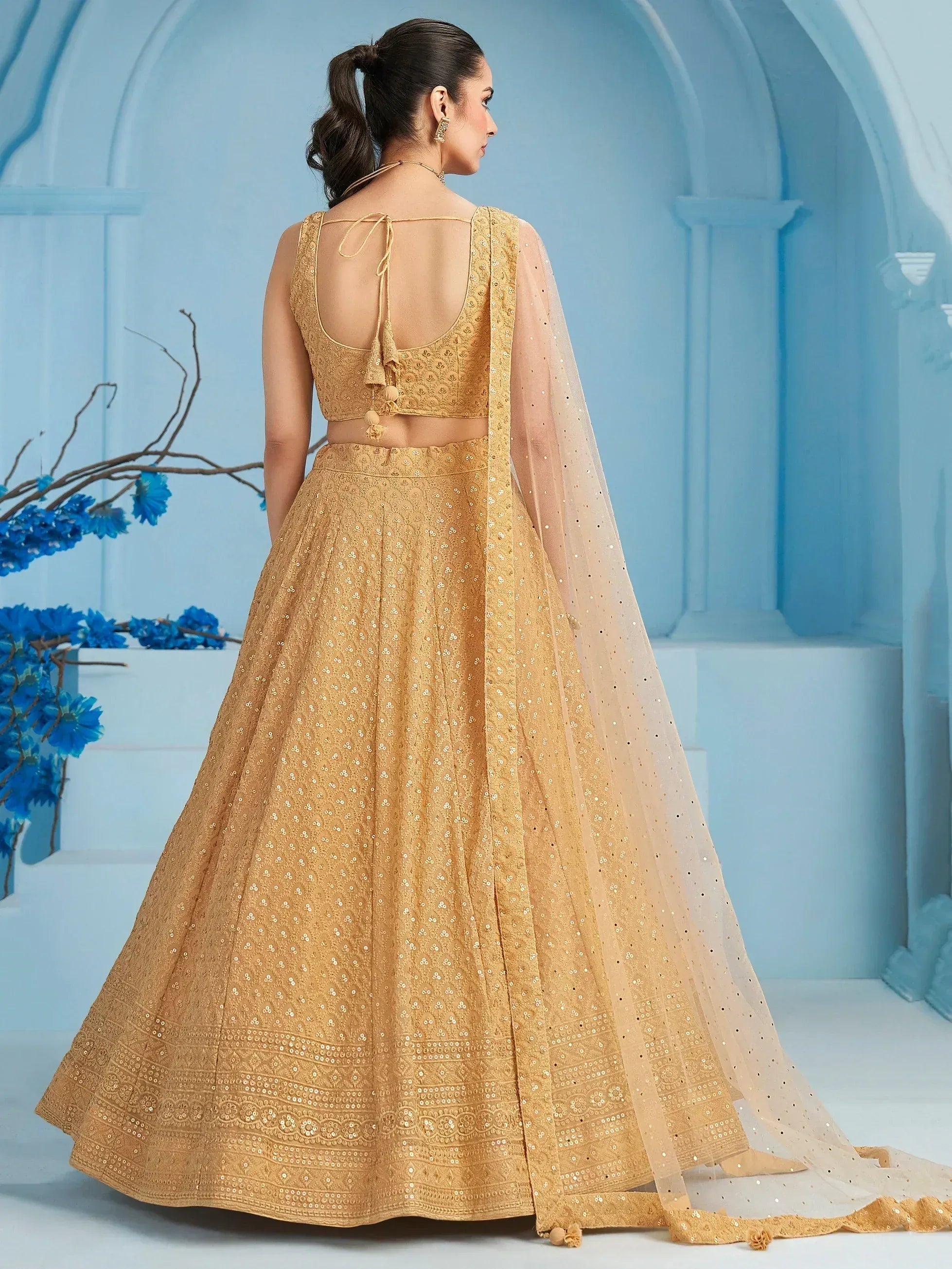 Golden embroidered lehenga choli with back tie blouse and sheer dupatta, Indian ethnic wear