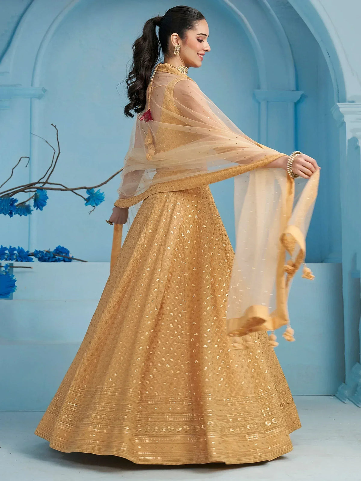 Golden sequined lehenga choli with sheer dupatta, Indian ethnic wear for weddings and parties