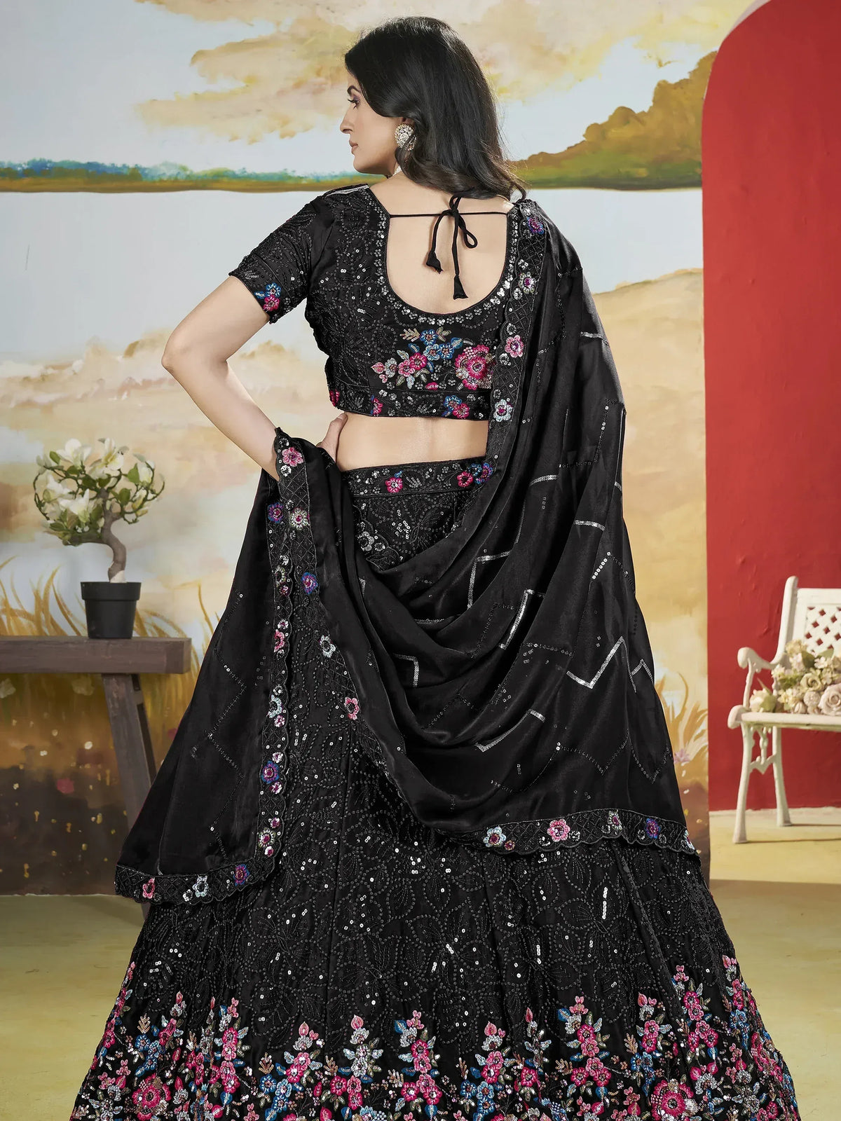 Black floral embroidered lehenga choli with sequin work, perfect for Indian ethnic occasions