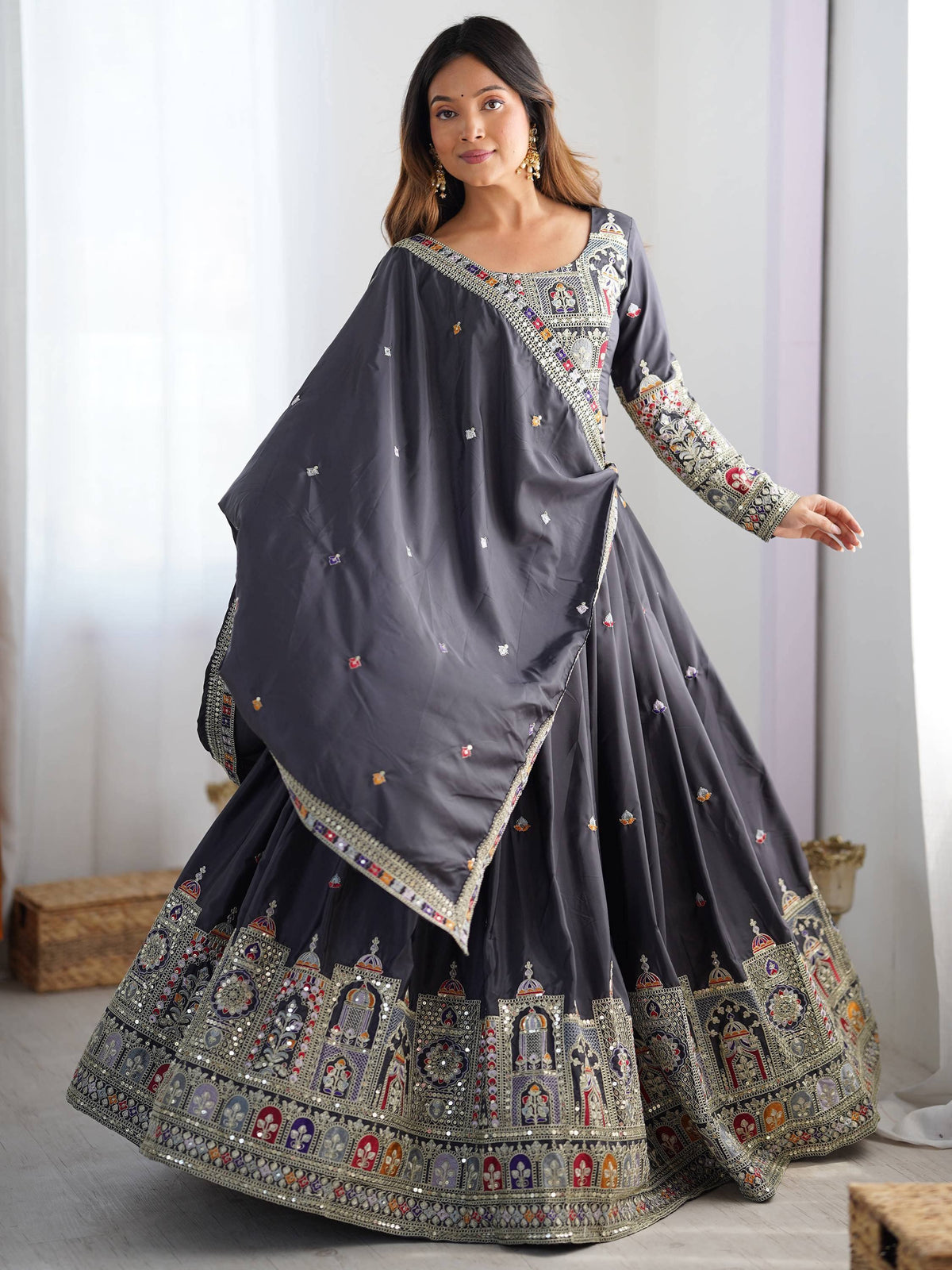 Grey embroidered lehenga choli with temple motifs, perfect for Indian ethnic wear occasions
