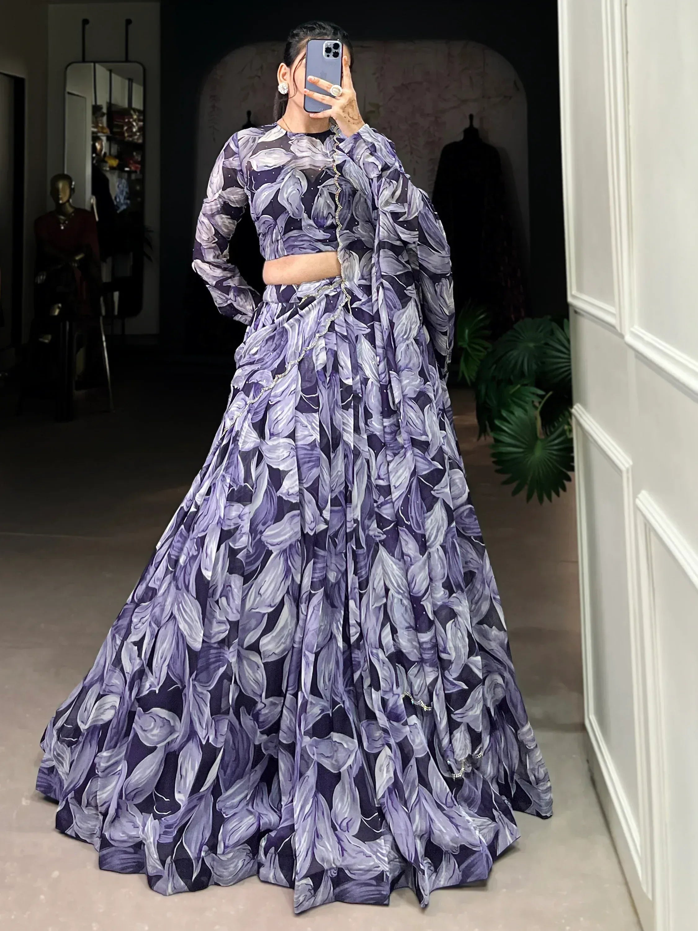 Purple floral print lehenga choli with long sleeves and embellished border, perfect for Indian ethnic wear