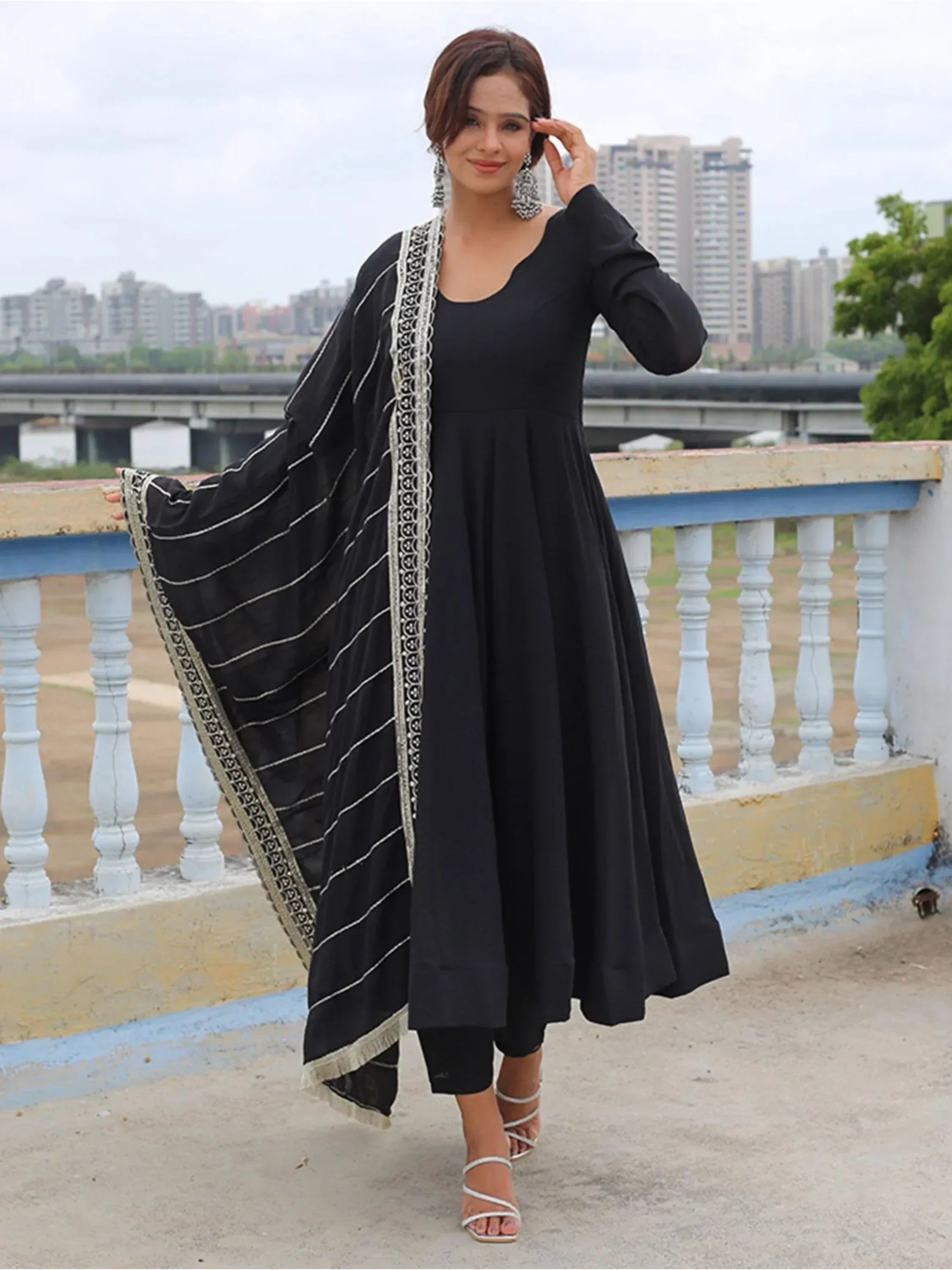 Black ethnic anarkali suit with embroidered dupatta, perfect for Indian wear occasions