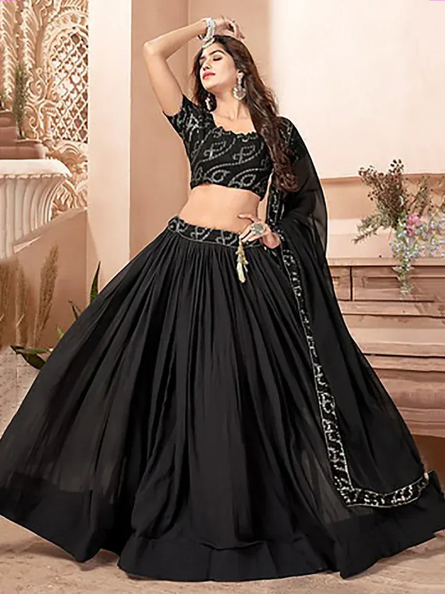 Black embroidered lehenga choli with sheer dupatta, ethnic Indian wear for weddings and parties