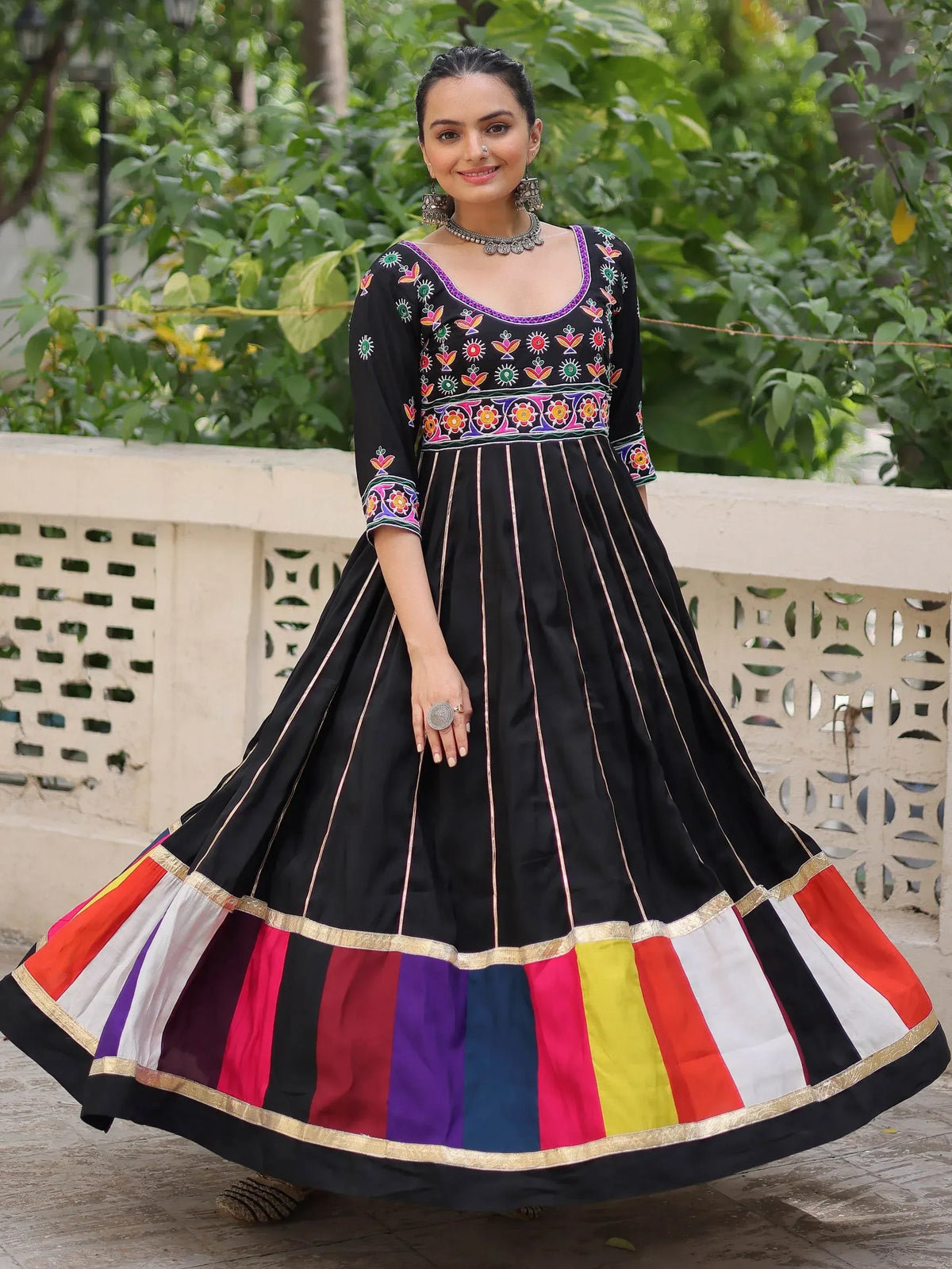 Black embroidered Anarkali with colorful striped border, Indian ethnic wear for women
