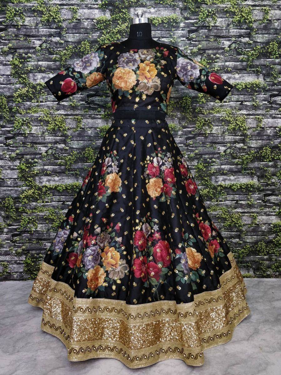 Black floral print ethnic gown with gold border, perfect for Indian occasions and festive wear