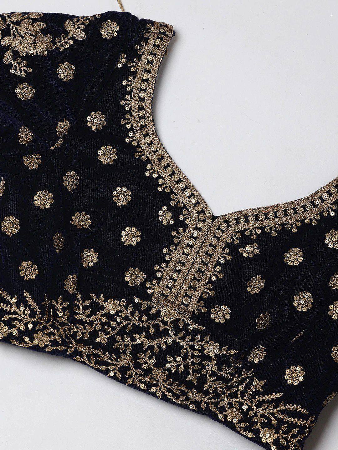 Black velvet blouse with gold floral embroidery and sequin detailing, perfect for ethnic wear.