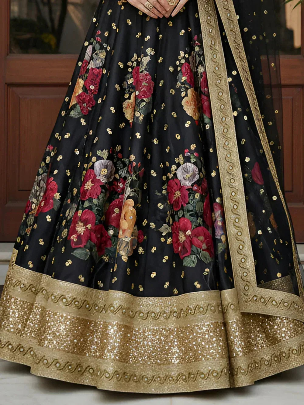 Black floral lehenga with gold embroidery and sequin border, ethnic Indian wear
