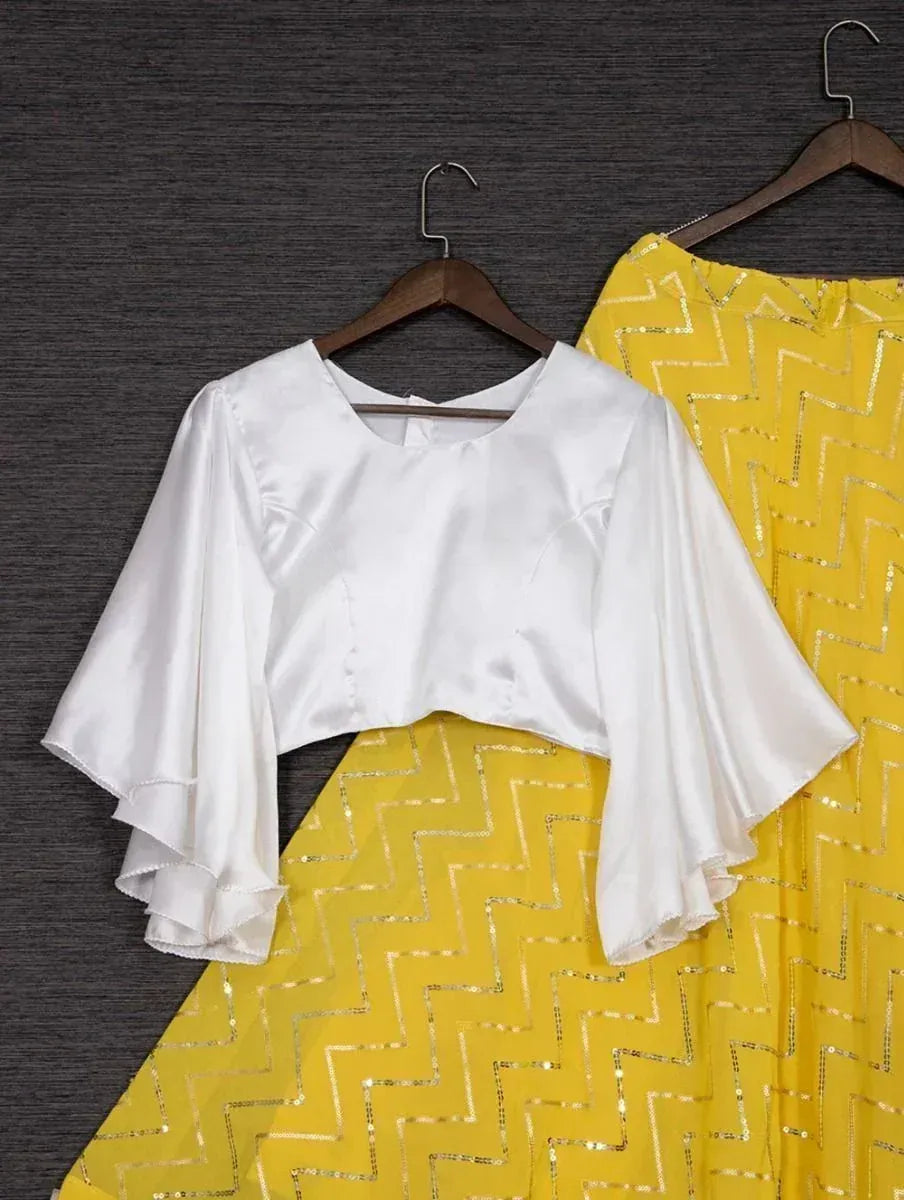 White ruffled crop top with yellow zigzag print skirt, ethnic wear set