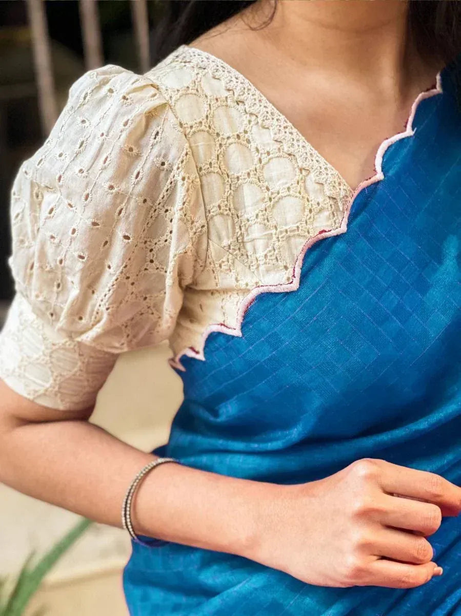 Blue saree with cream lace blouse, scalloped neckline, puff sleeves, ethnic wear