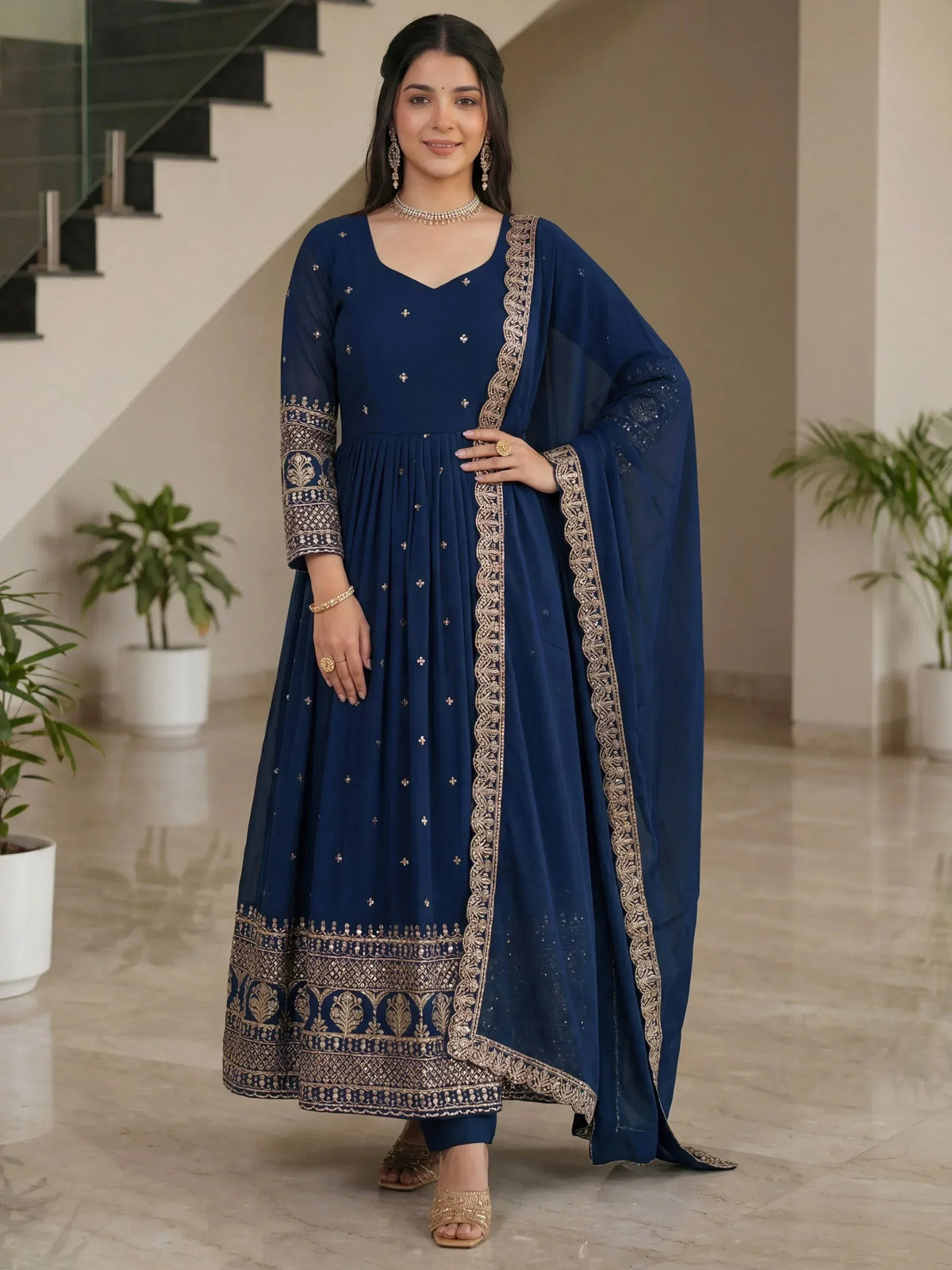 Navy blue embroidered anarkali suit with gold detailing, perfect for Indian ethnic wear occasions