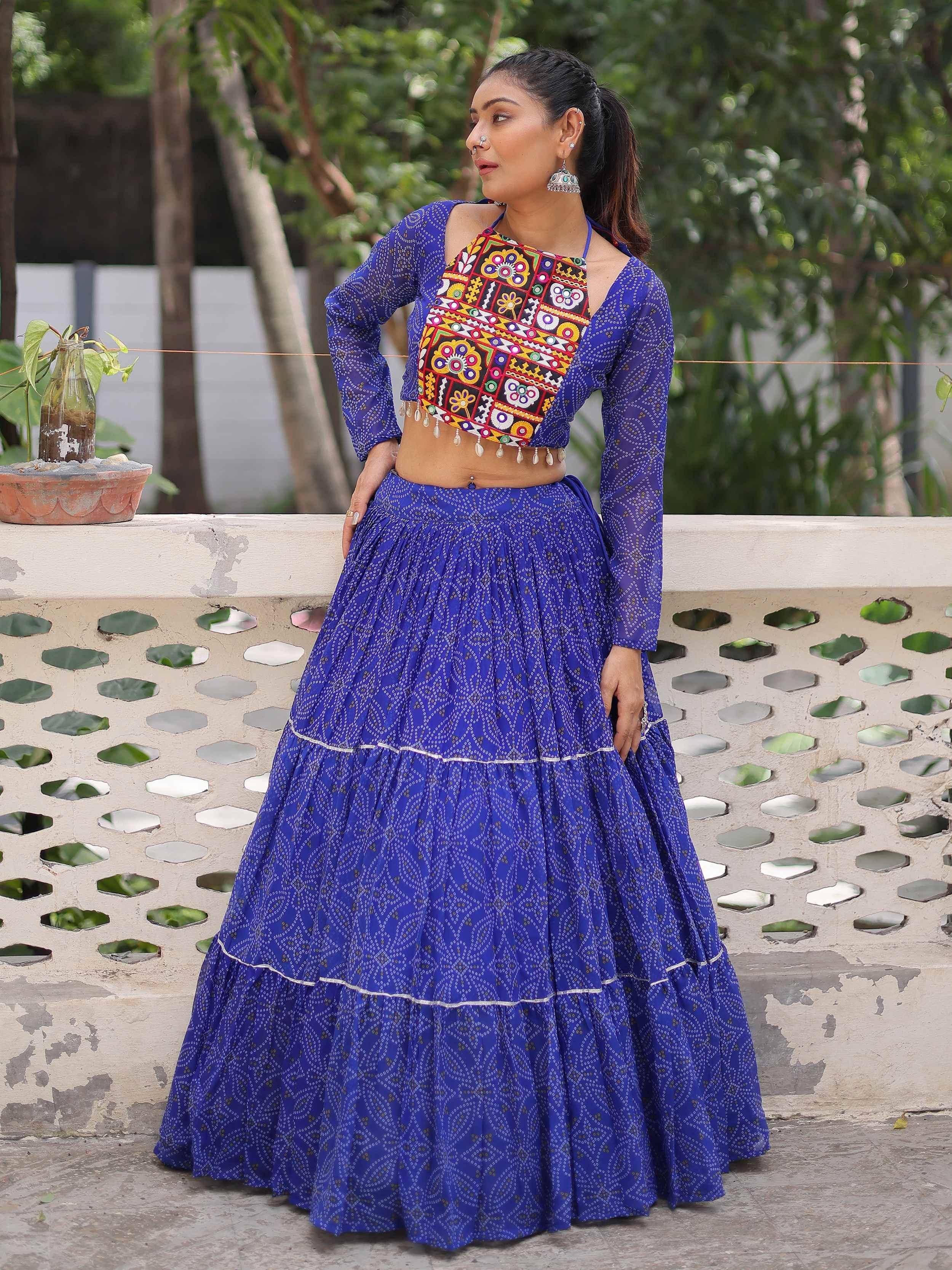 Blue printed lehenga with colorful embroidered crop top, ethnic Indian wear for women