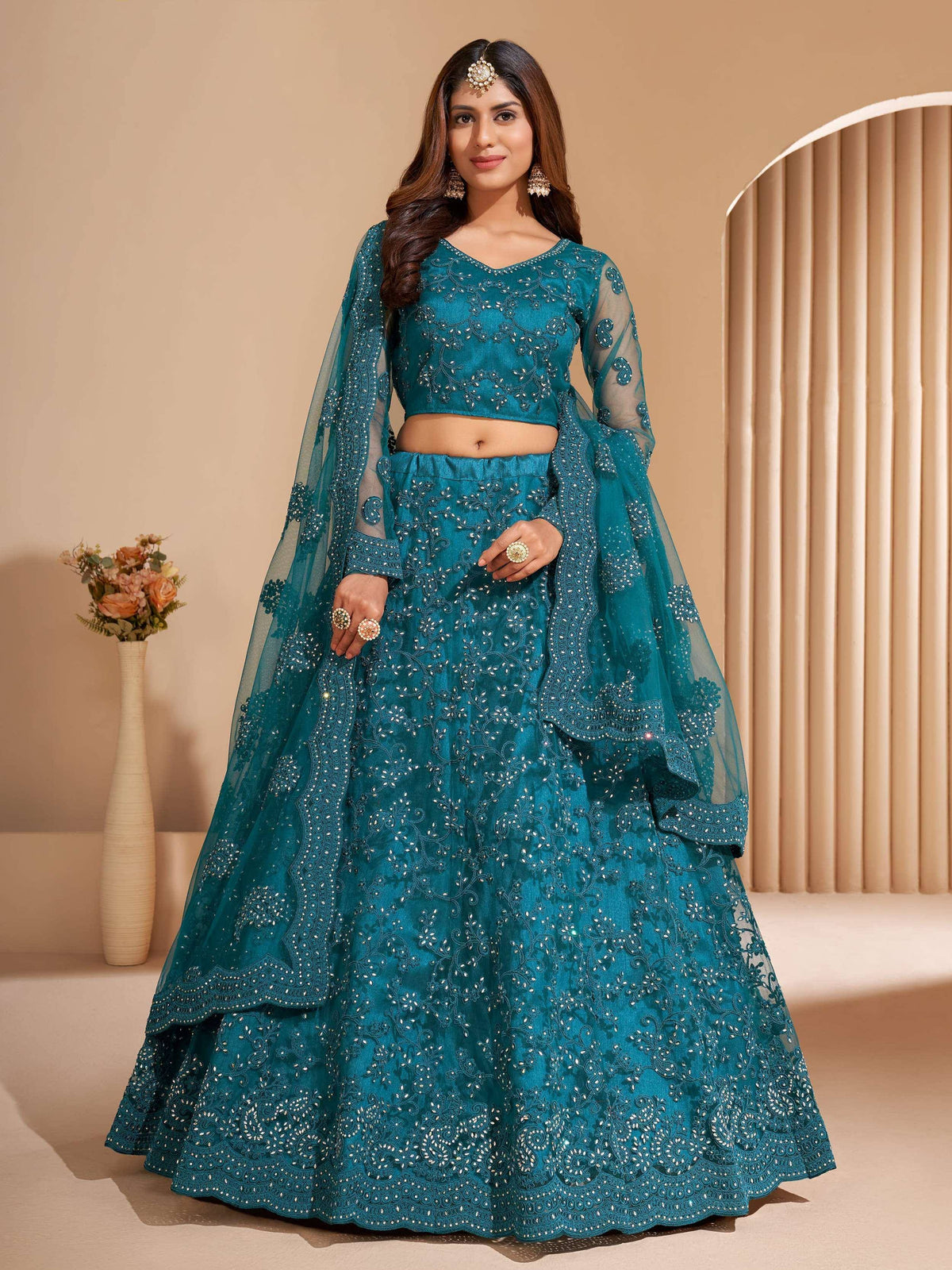 Teal embroidered lehenga choli with sheer dupatta, Indian ethnic wear for weddings and parties
