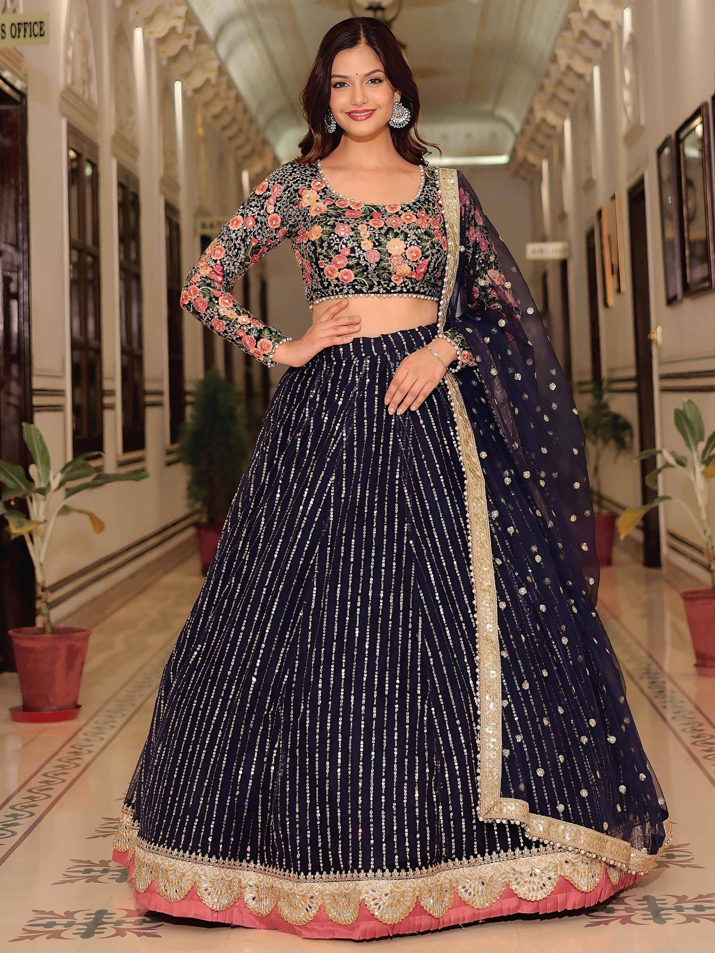 Navy blue lehenga choli with floral embroidery and sequin work, perfect for Indian weddings and festive occasions