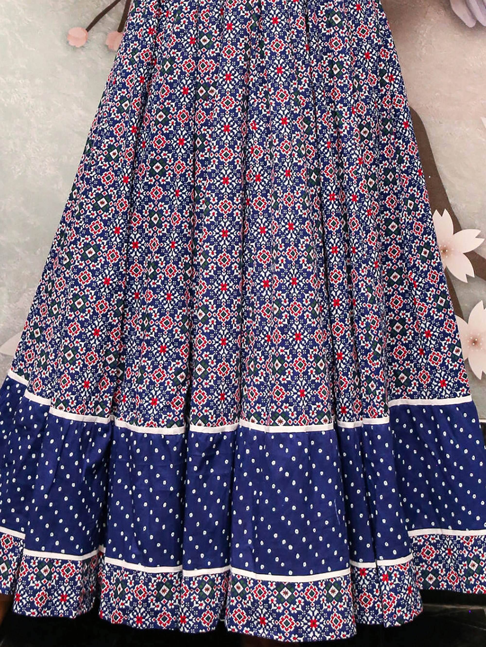 Blue printed ethnic skirt with geometric patterns and polka dot hem, ideal for Indian wear