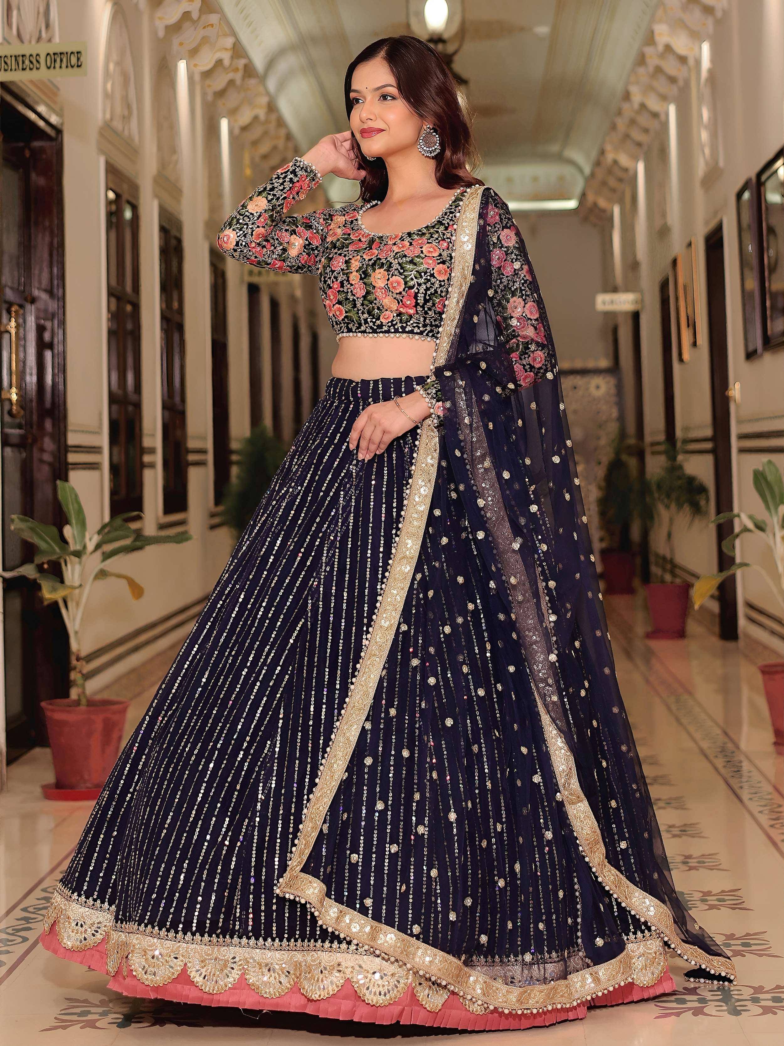 Navy blue floral embroidered lehenga choli with gold detailing, perfect for Indian ethnic wear events
