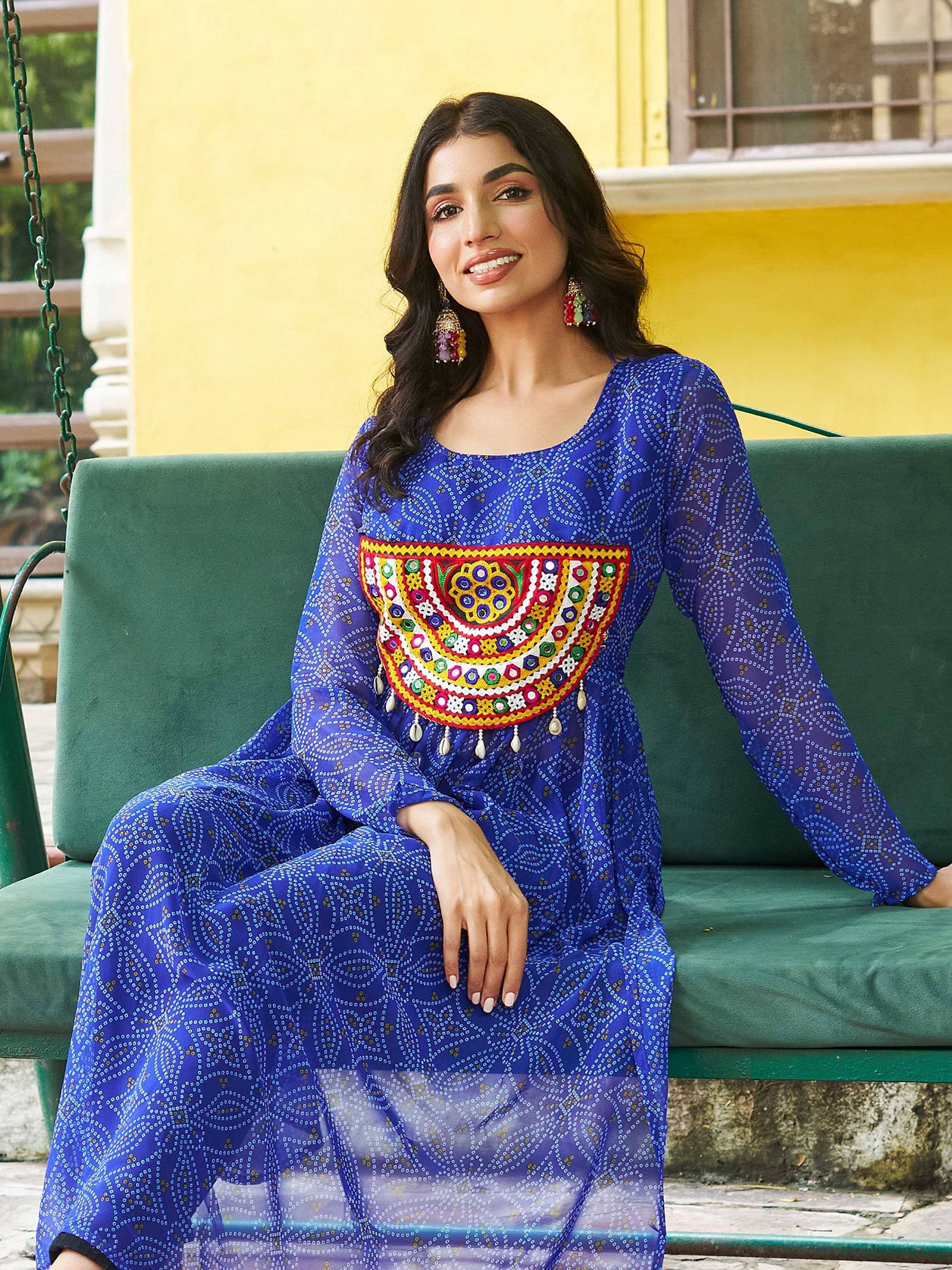 Blue ethnic gown with colorful mirror work, perfect for Indian festive wear and designer occasions.