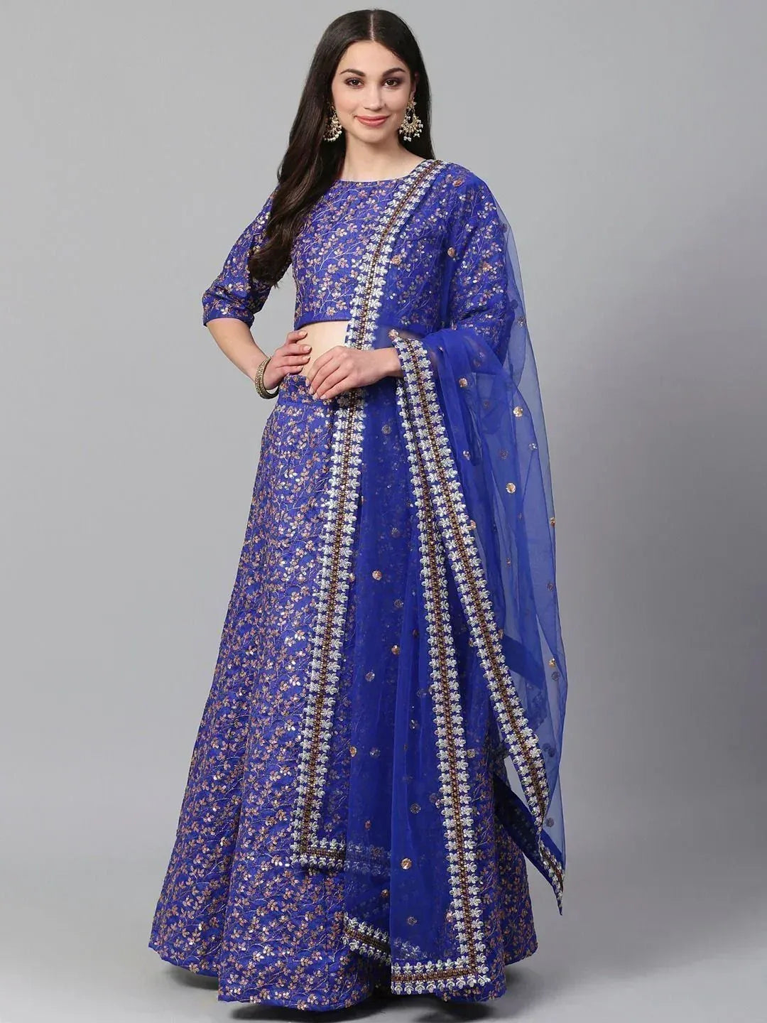 Royal blue embroidered lehenga choli with floral motifs and matching dupatta, ideal for Indian ethnic occasions