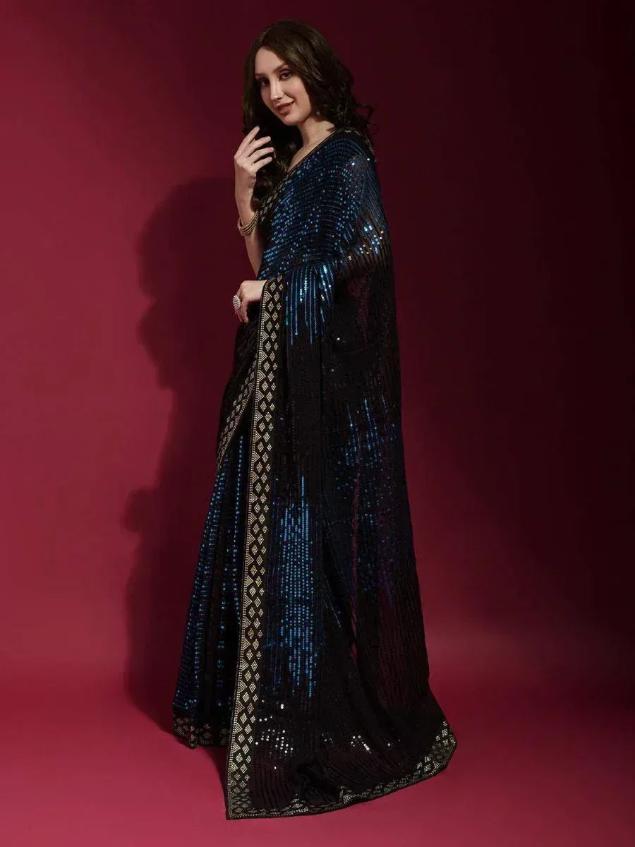Elegant blue sequin saree with gold border, perfect for Indian ethnic occasions