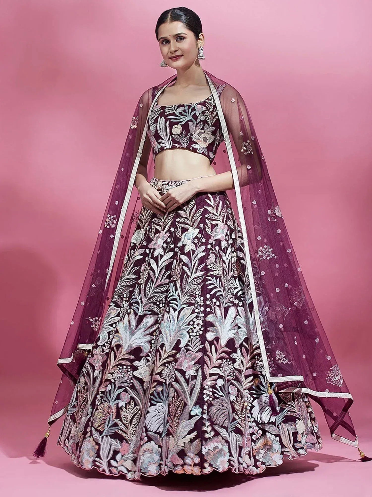 Elegant maroon lehenga choli with floral embroidery and sheer dupatta, perfect for Indian ethnic occasions
