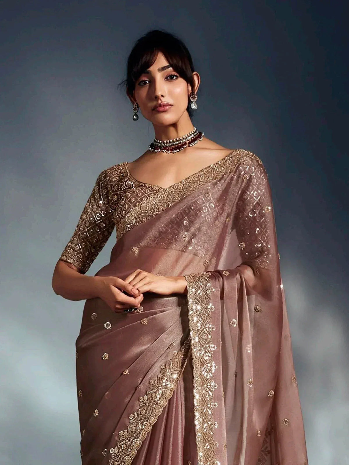 Elegant mauve saree with gold embroidery and designer blouse for ethnic wear