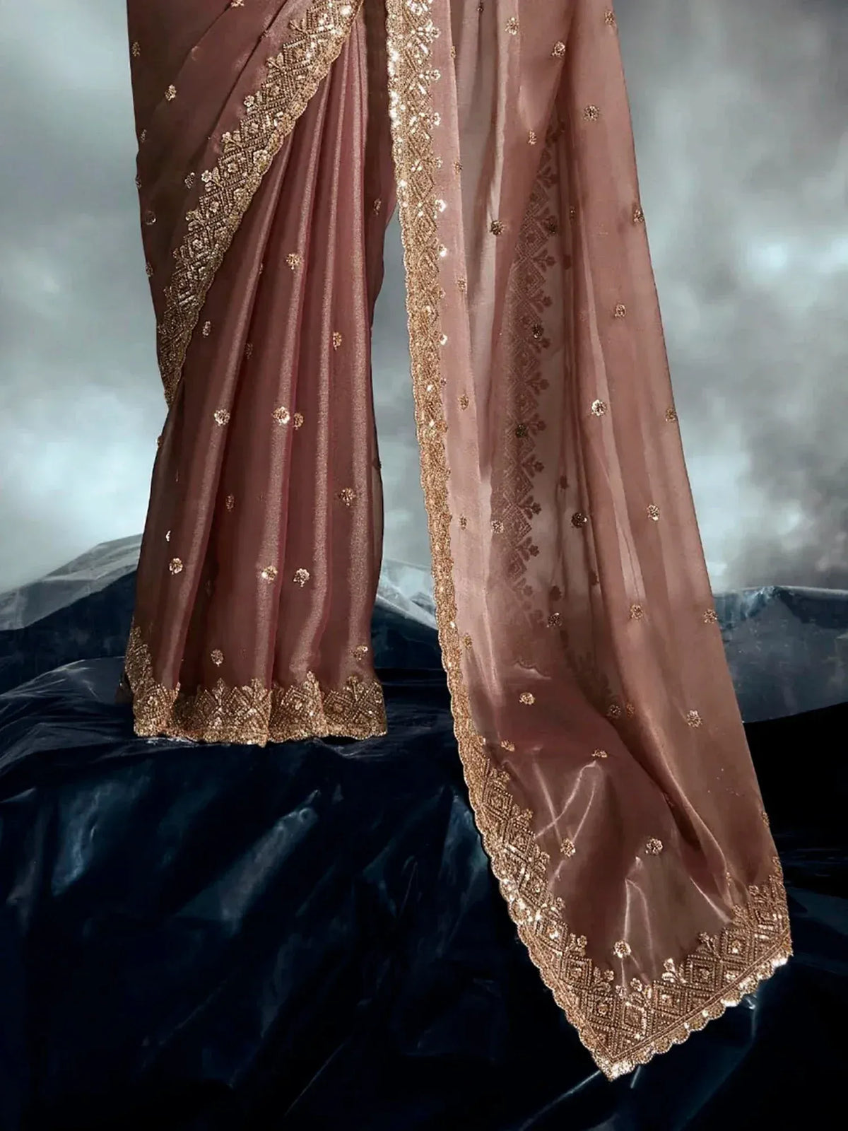 Elegant brown saree with gold embroidery and sequin detailing, perfect for Indian ethnic wear occasions