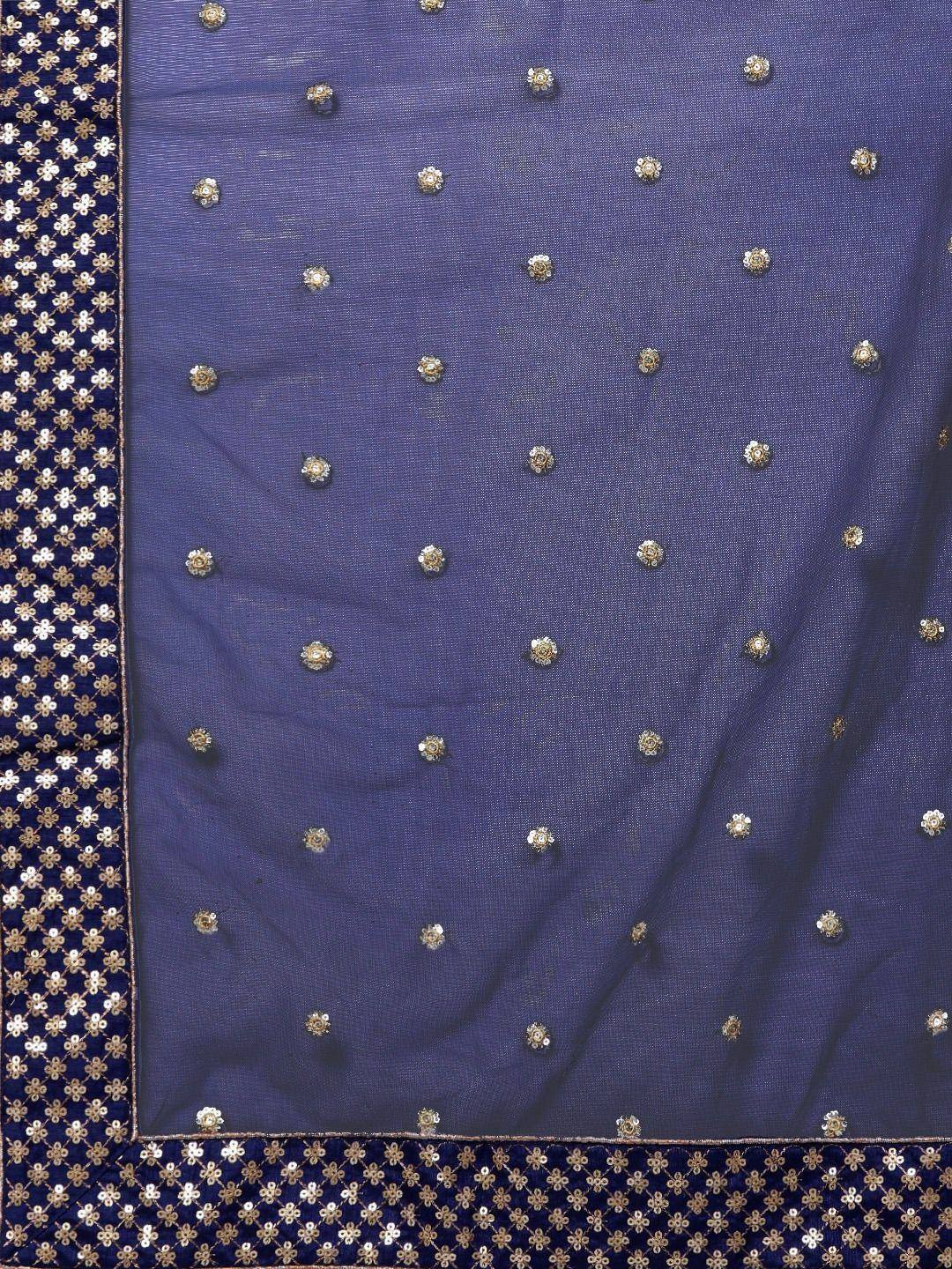 Purple ethnic saree with gold floral embroidery and sequin border, ideal for Indian festive wear