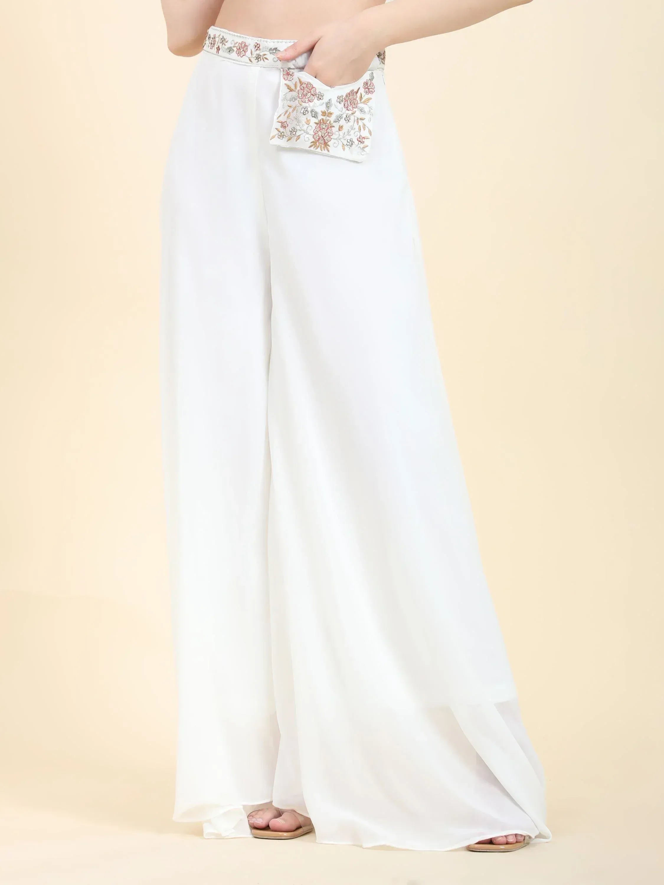 White palazzo pants with floral embroidery at waist and pocket, Indian ethnic wear