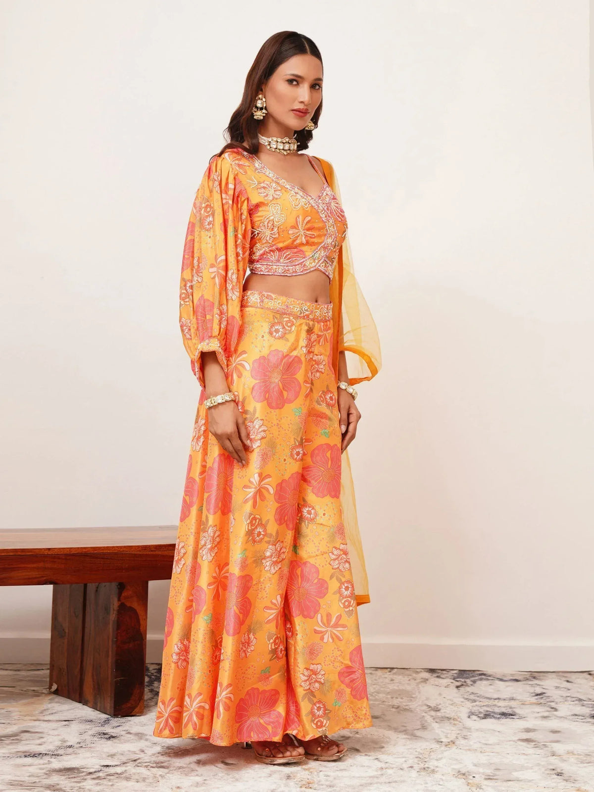 Orange floral printed ethnic sharara set with embroidered crop top and dupatta