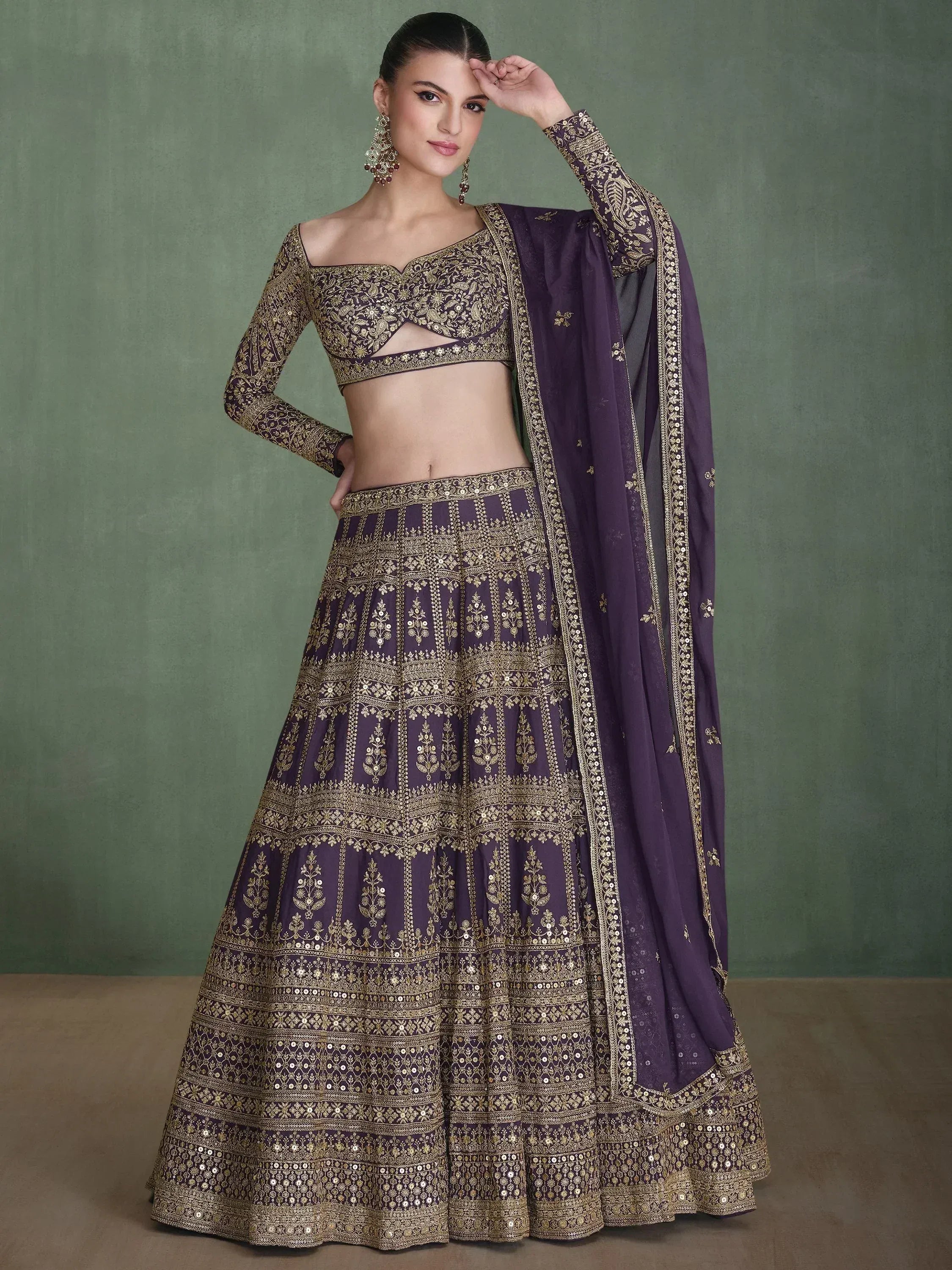 Purple designer lehenga choli with gold embroidery and sequins, ethnic Indian wear for weddings